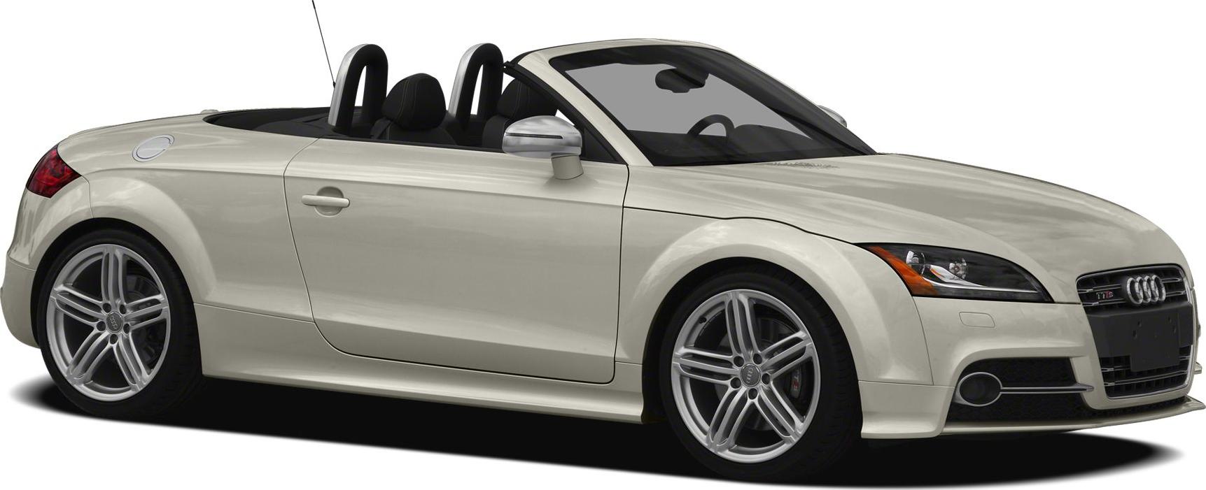 White convertible with sleek side profile and alloy wheels