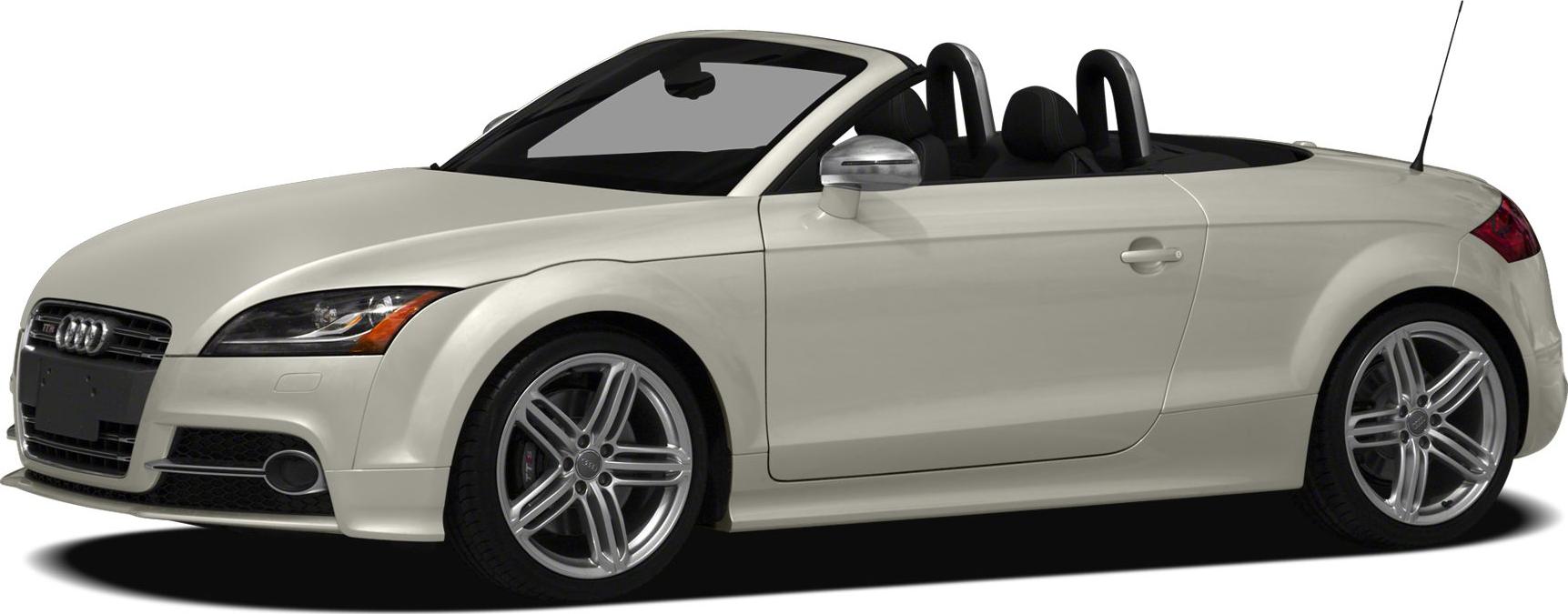 White convertible sports car with alloy wheels and open-top design