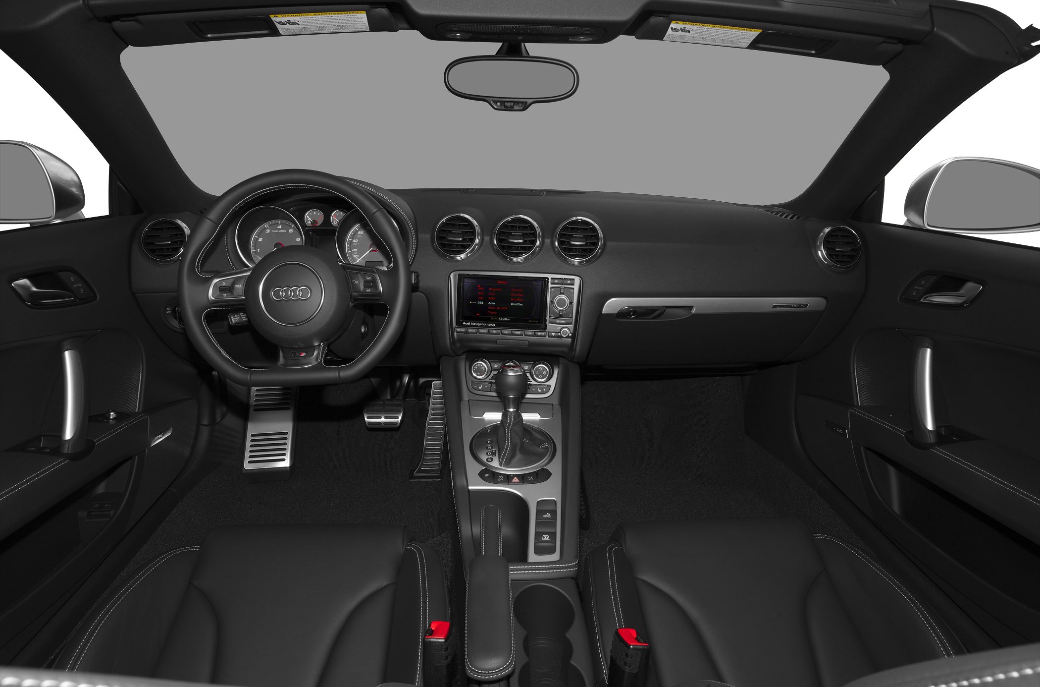 Car interior with dashboard, steering wheel, and center console