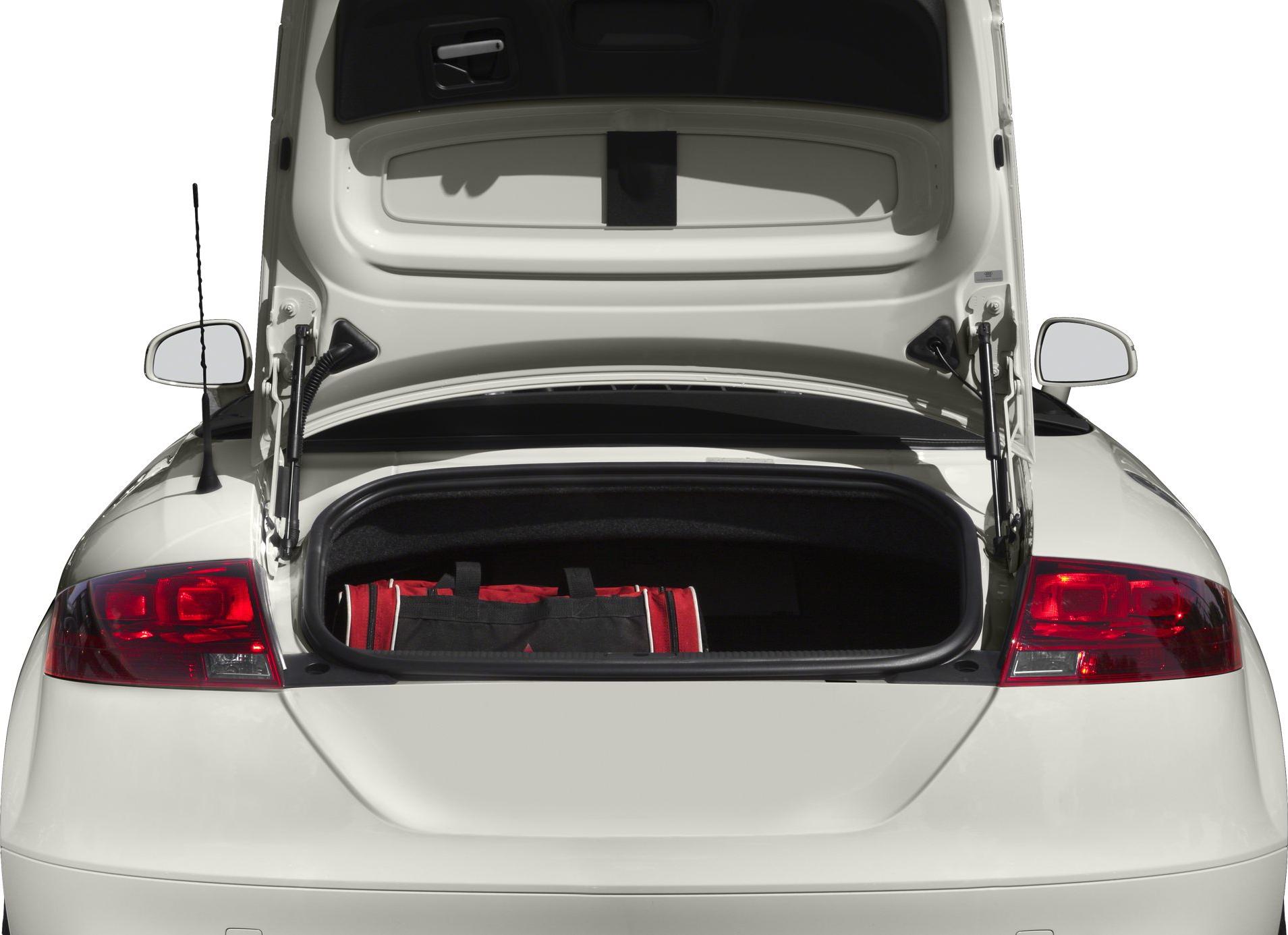 Rear trunk open with red bag inside and visible taillights