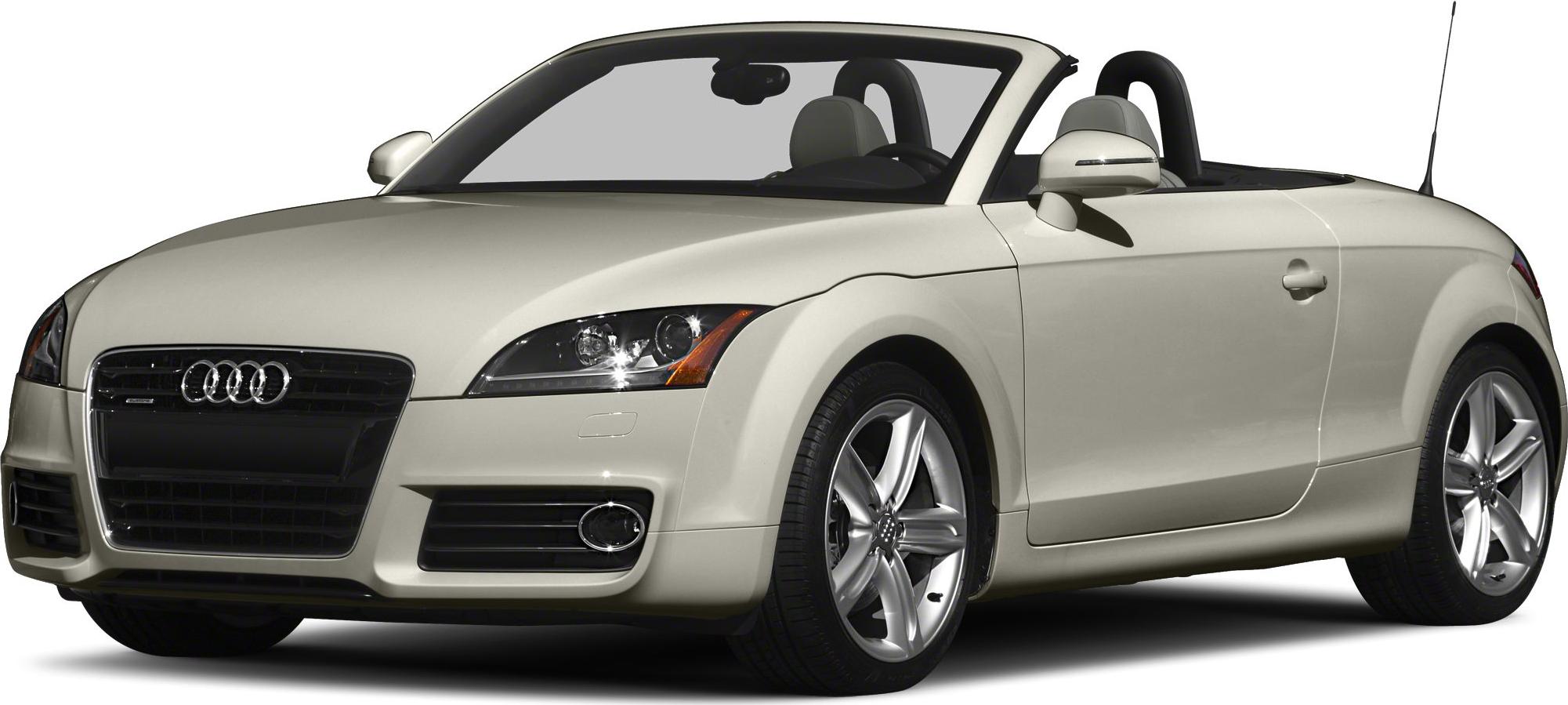 Front side view of beige convertible with alloy wheels