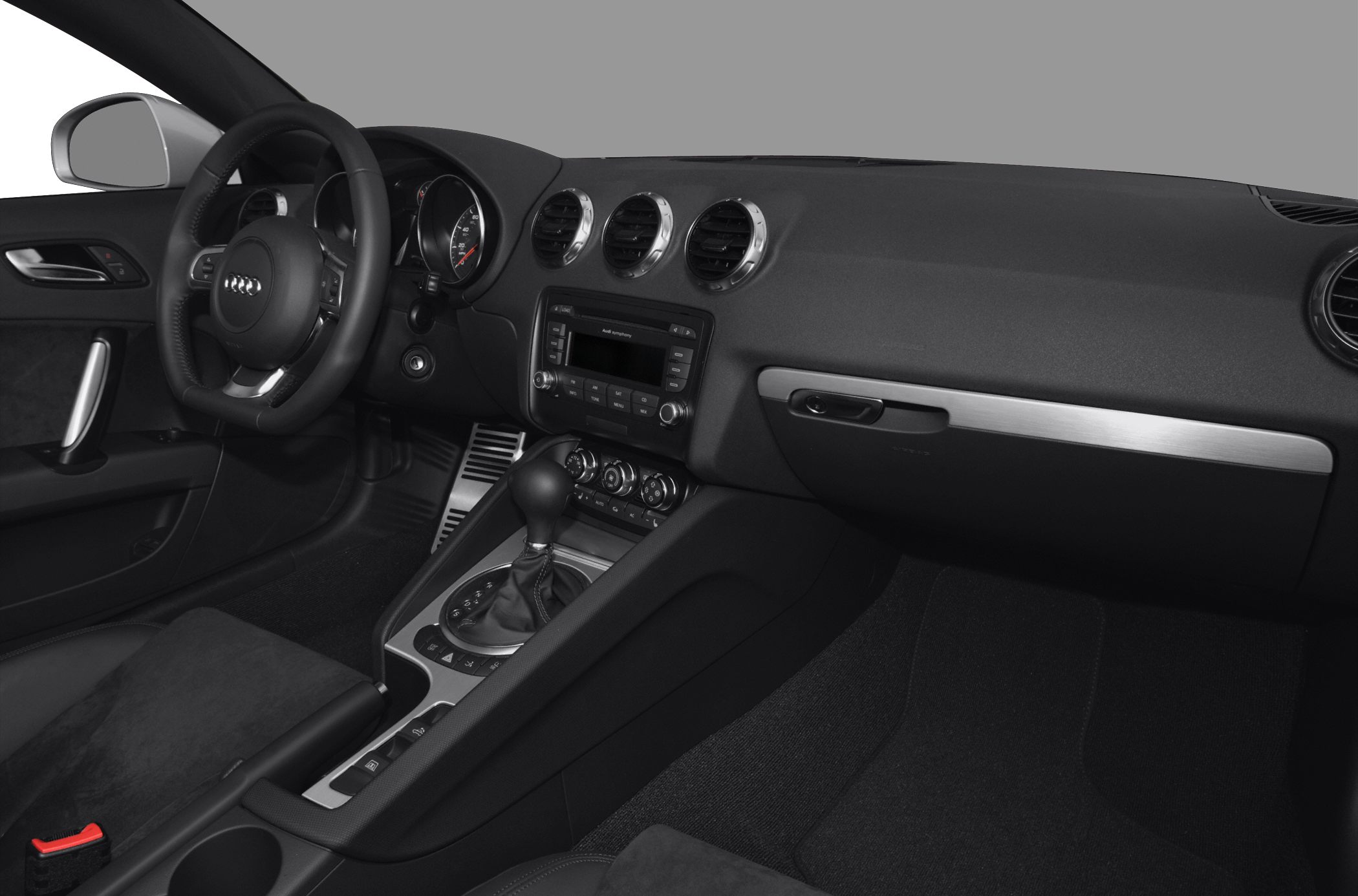 Dashboard and steering wheel with center console and air vents