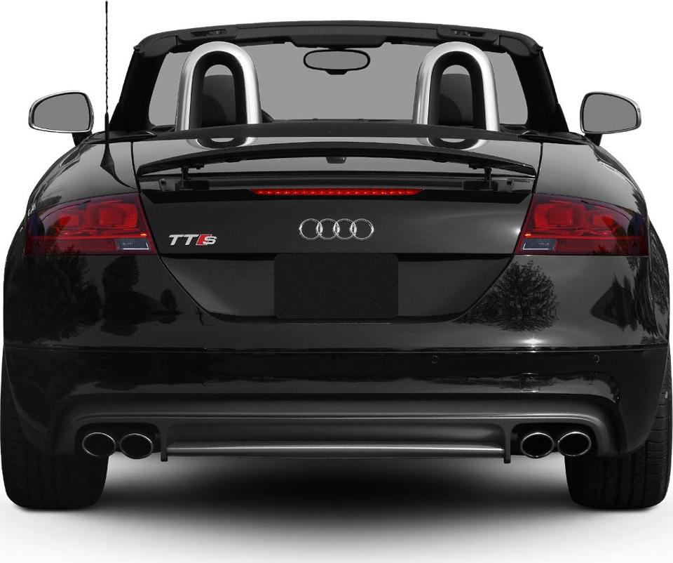 Rear view with dual exhaust, spoiler, and roll bars on a convertible
