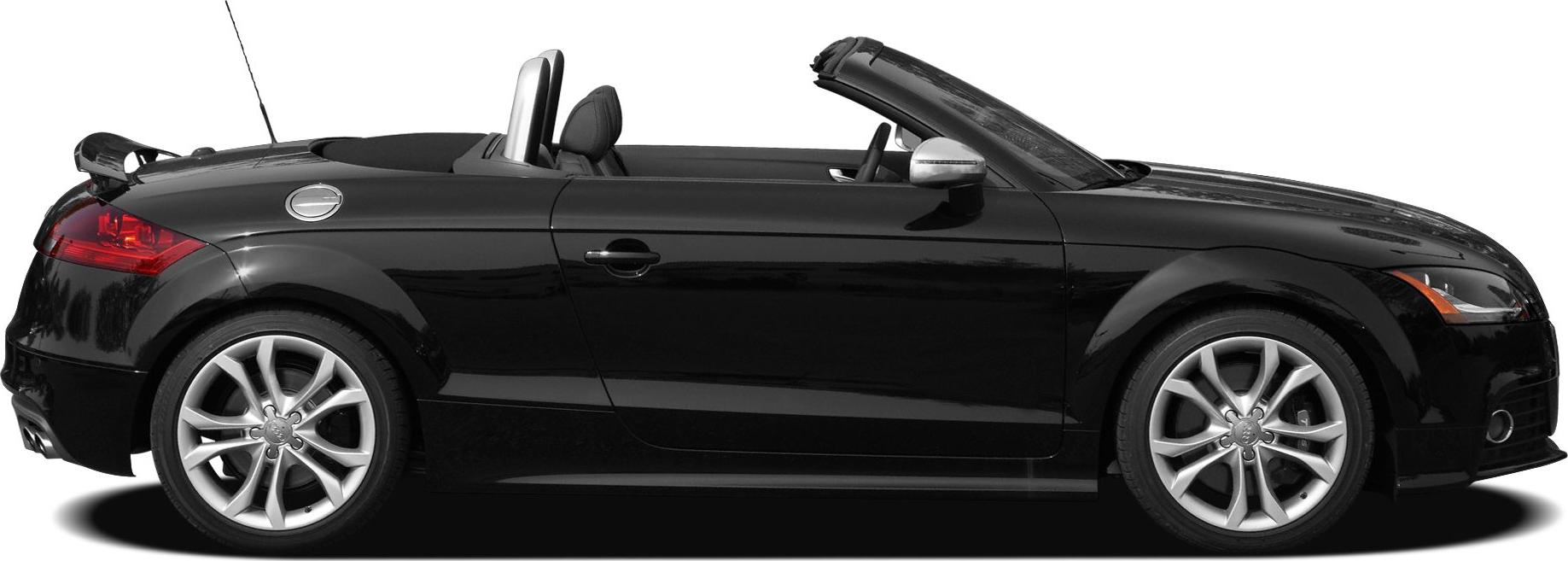 Side profile of black convertible with open roof and alloy wheels