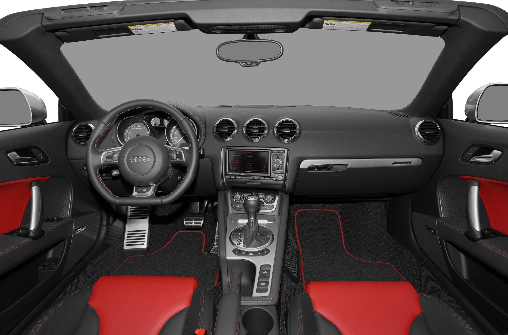 Sporty red leather seats and modern dashboard with three central air vents