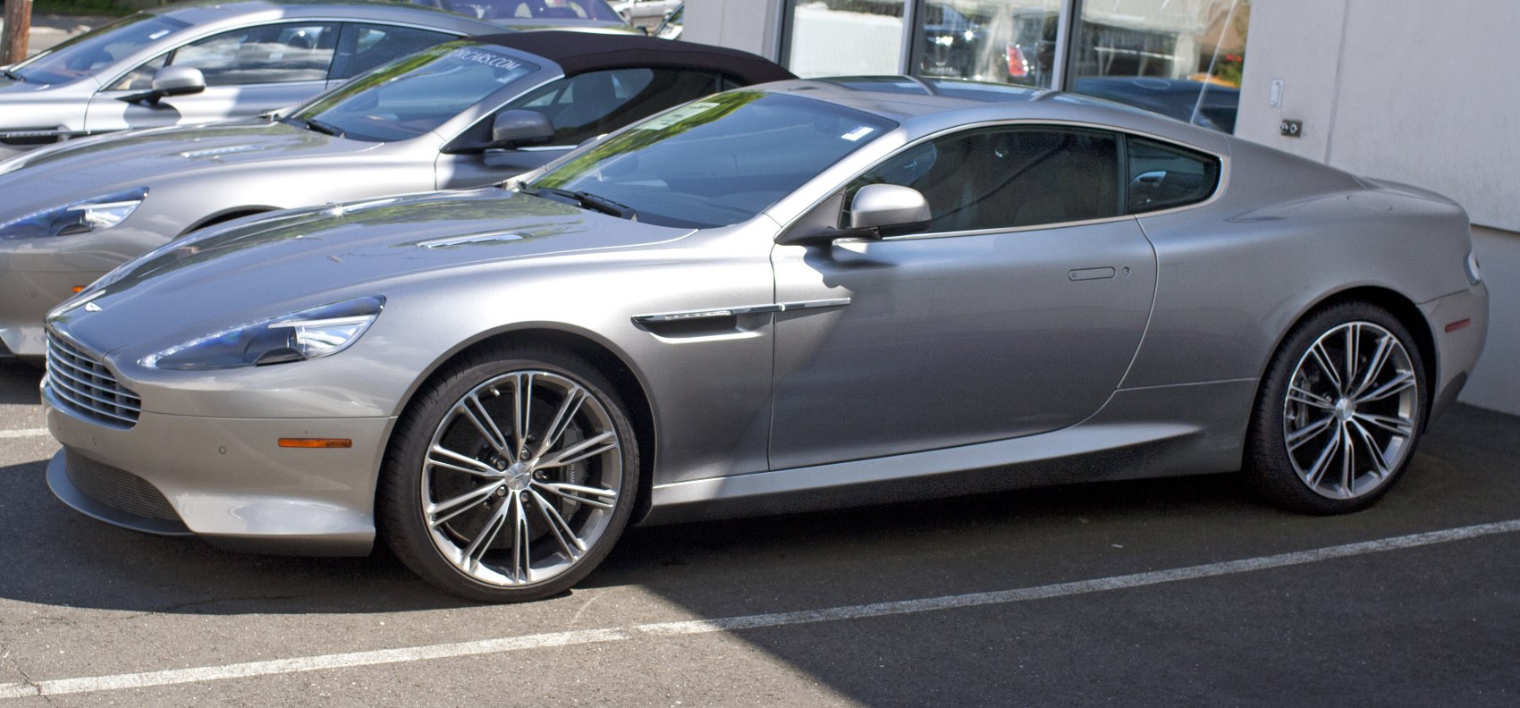 Sleek silver luxury sports coupe with alloy wheels