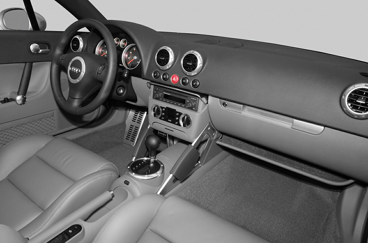 Dashboard and automatic gear shift with steering wheel and seats