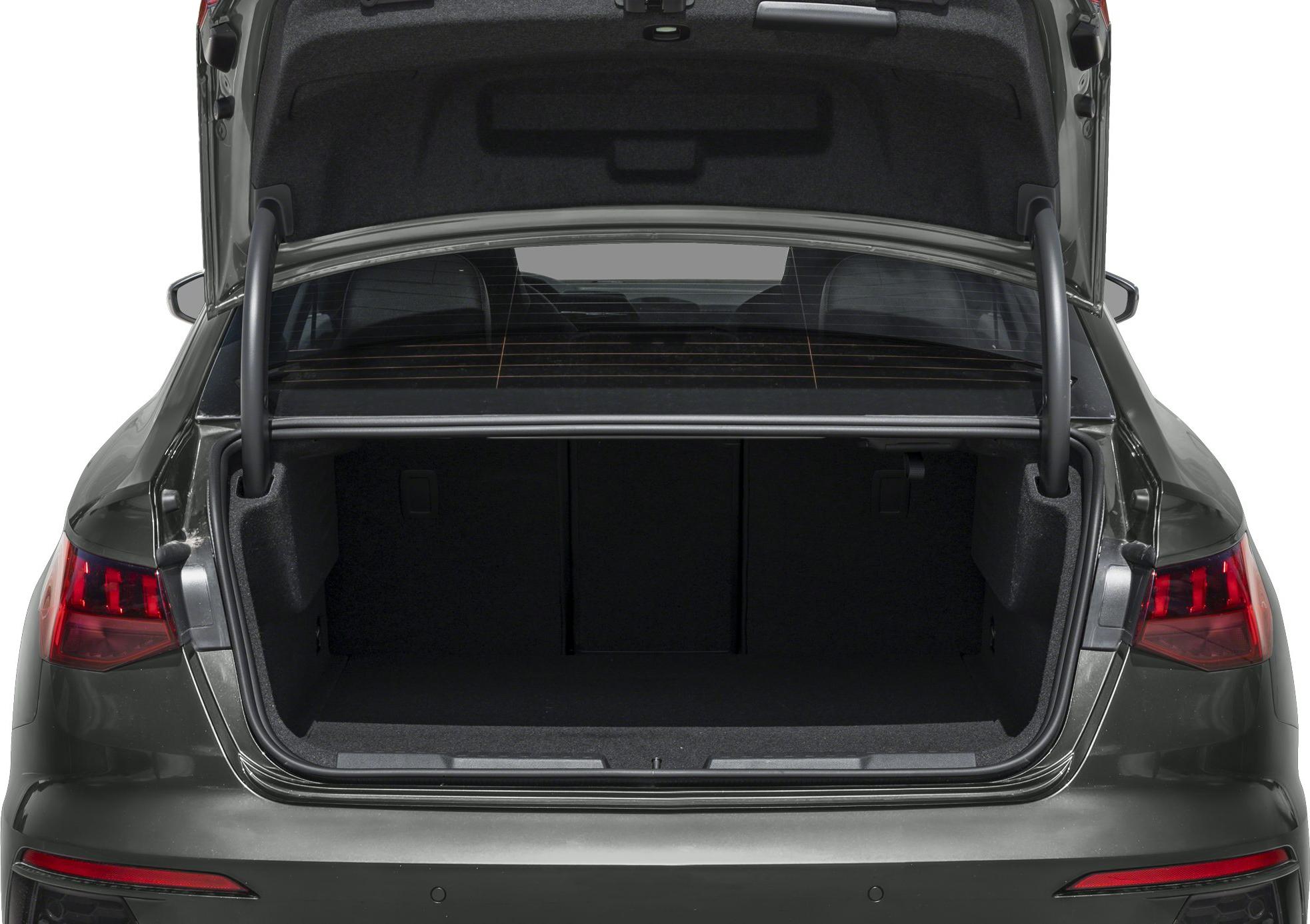 Spacious open trunk with rear taillights and trunk hinges visible