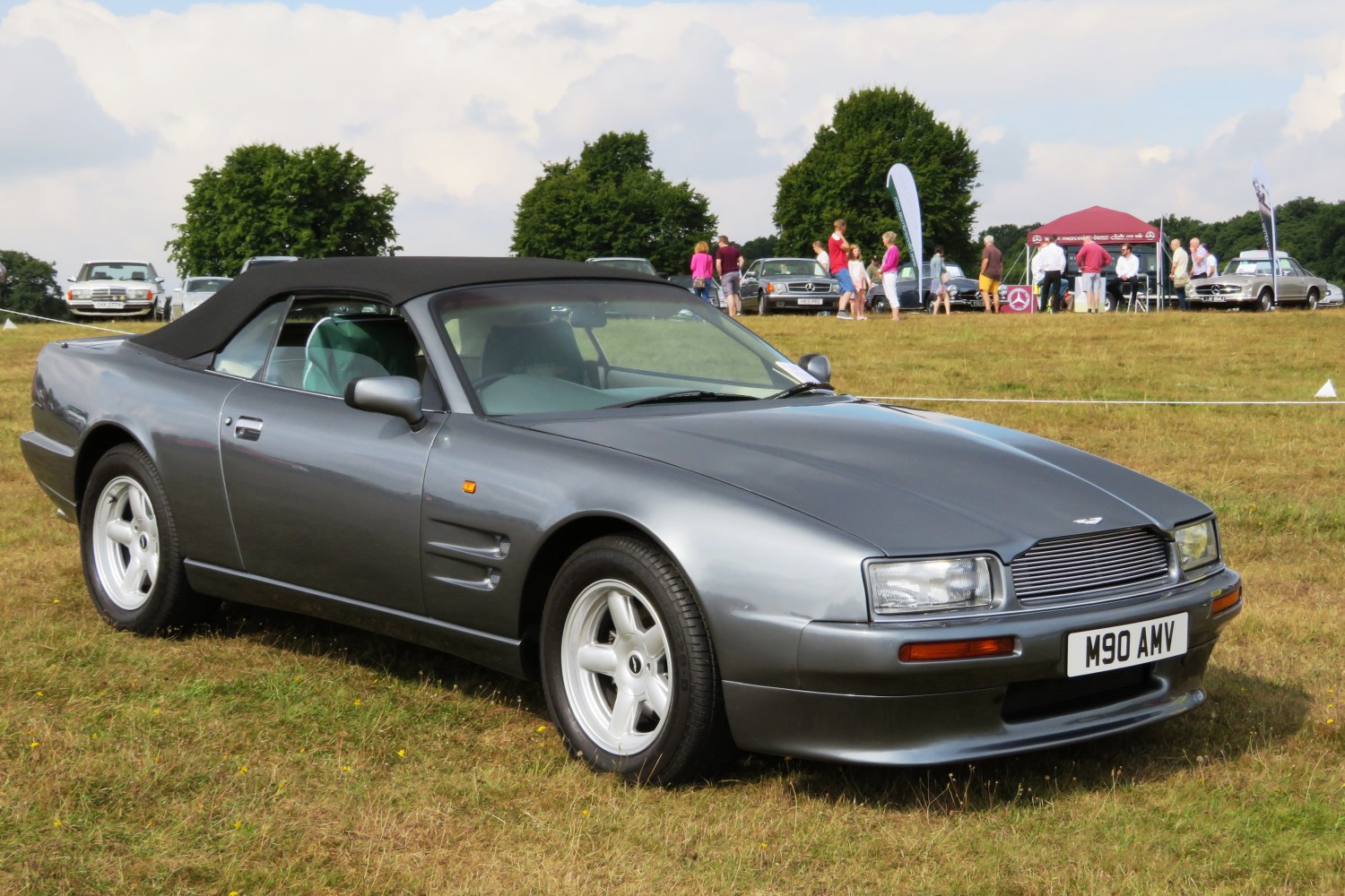 Convertible soft top and sleek aerodynamic body design