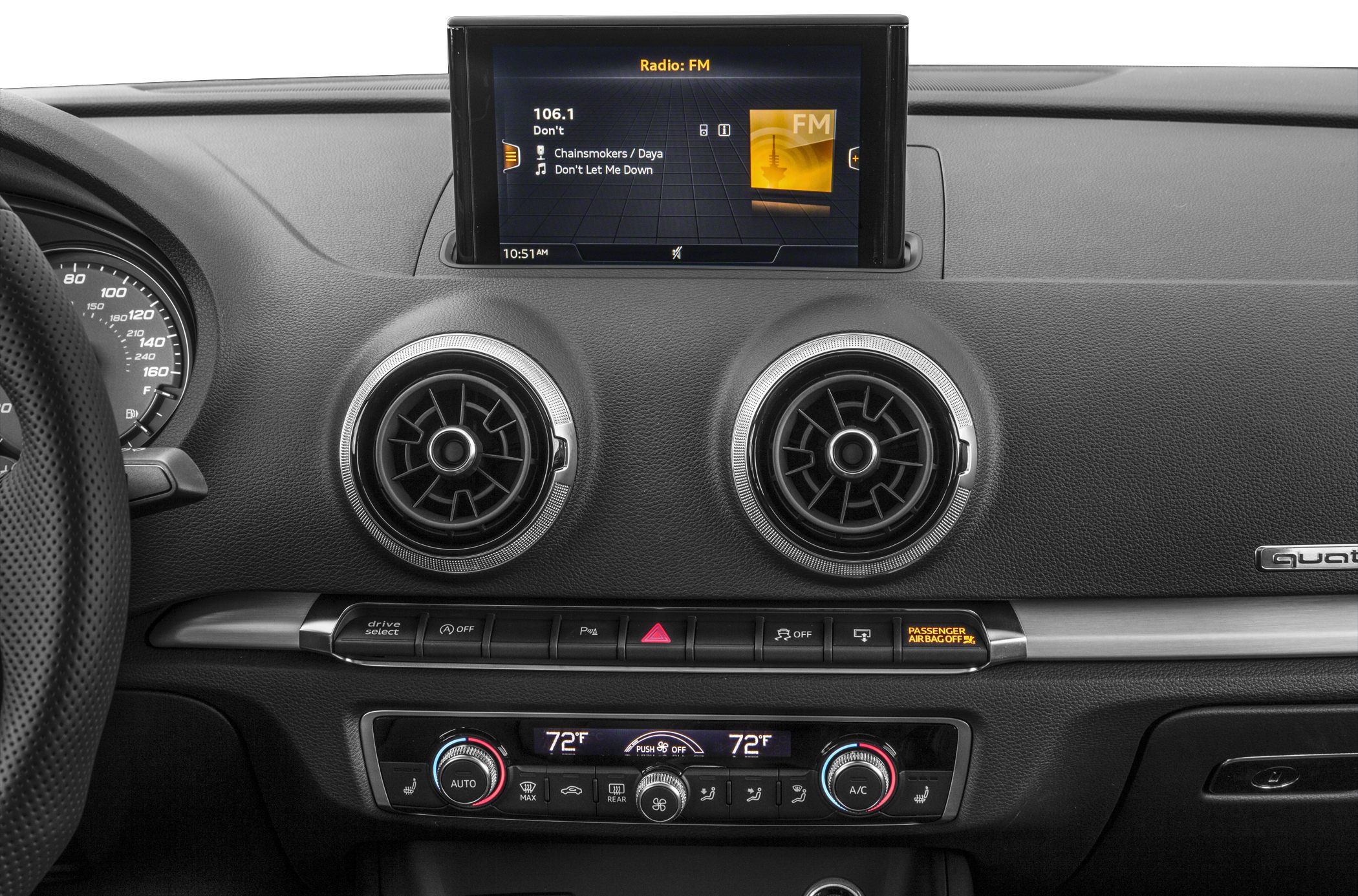 Dual circular air vents with infotainment and climate control panels