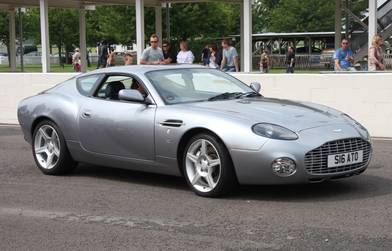 Silver sports coupe with distinctive grille and alloy wheels