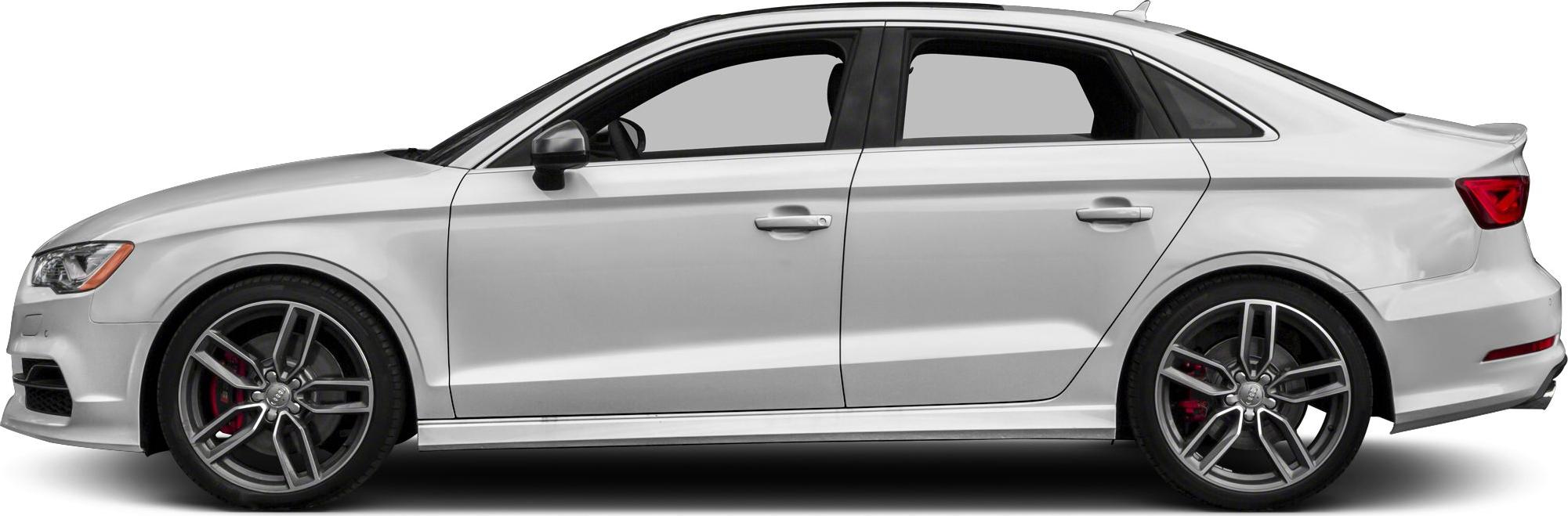 Silver sedan side view with sporty alloy wheels and red brake calipers