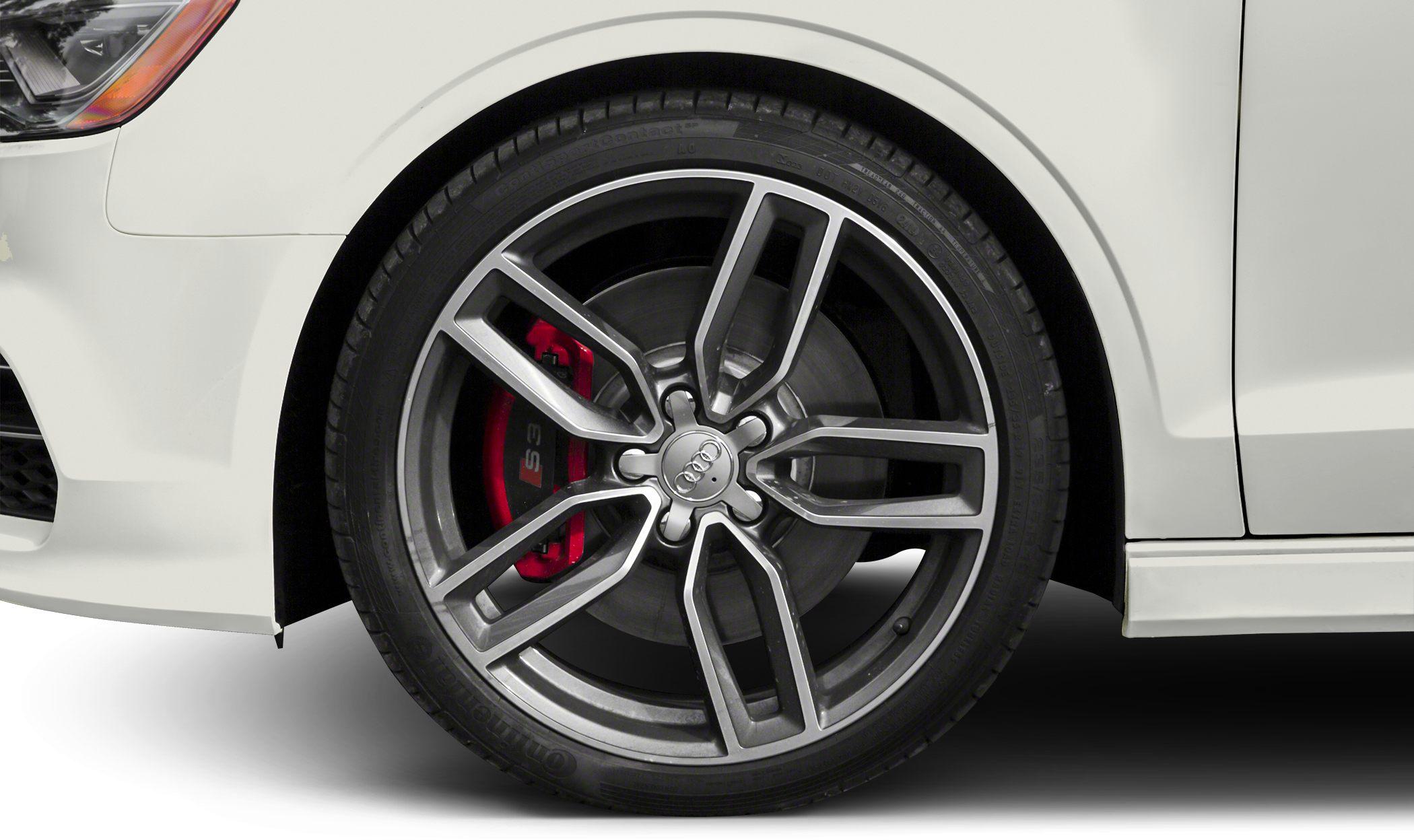 Alloy wheel with red brake caliper and S3 logo