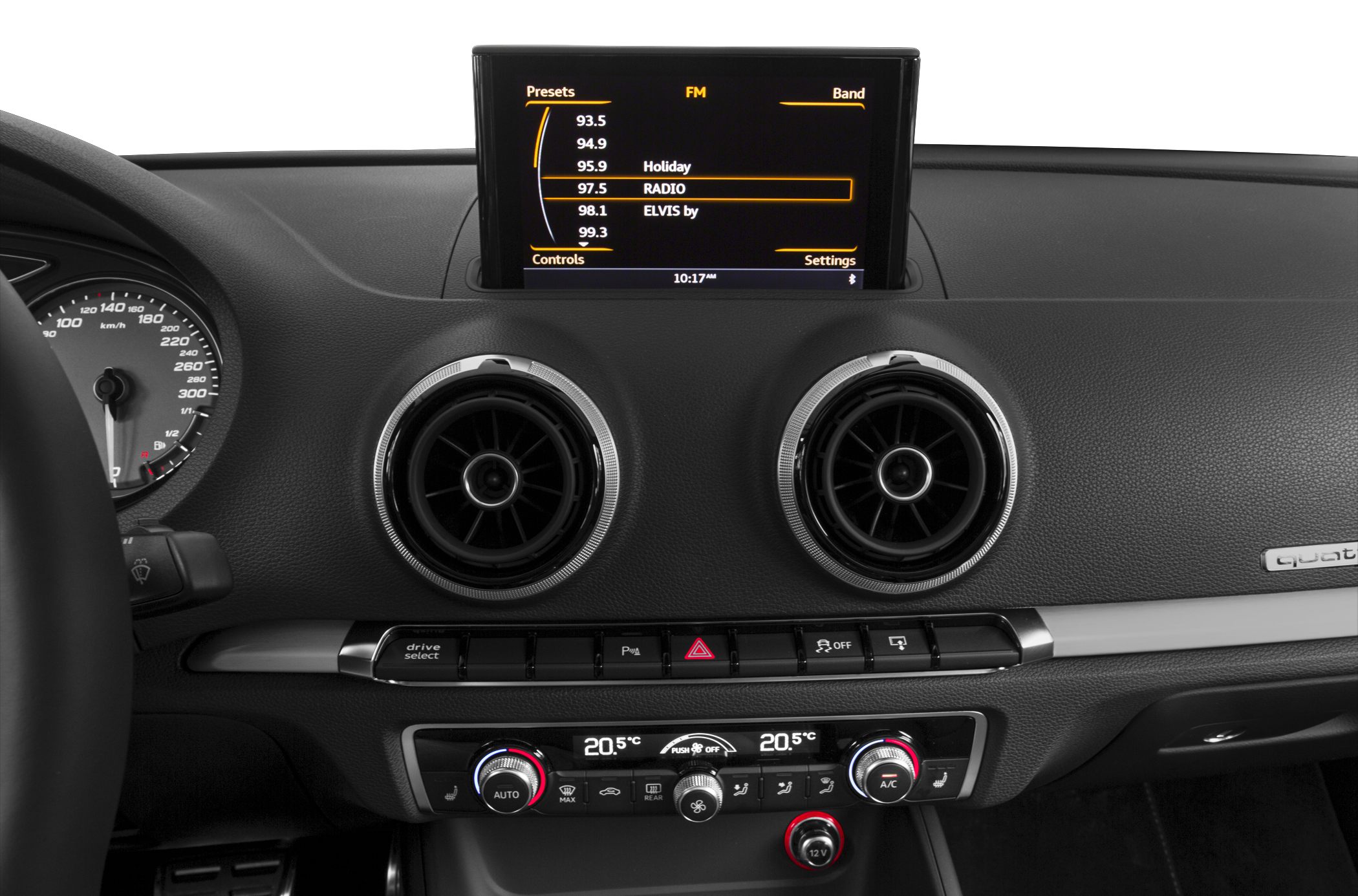 Digital infotainment screen and circular air vents with climate control dashboard