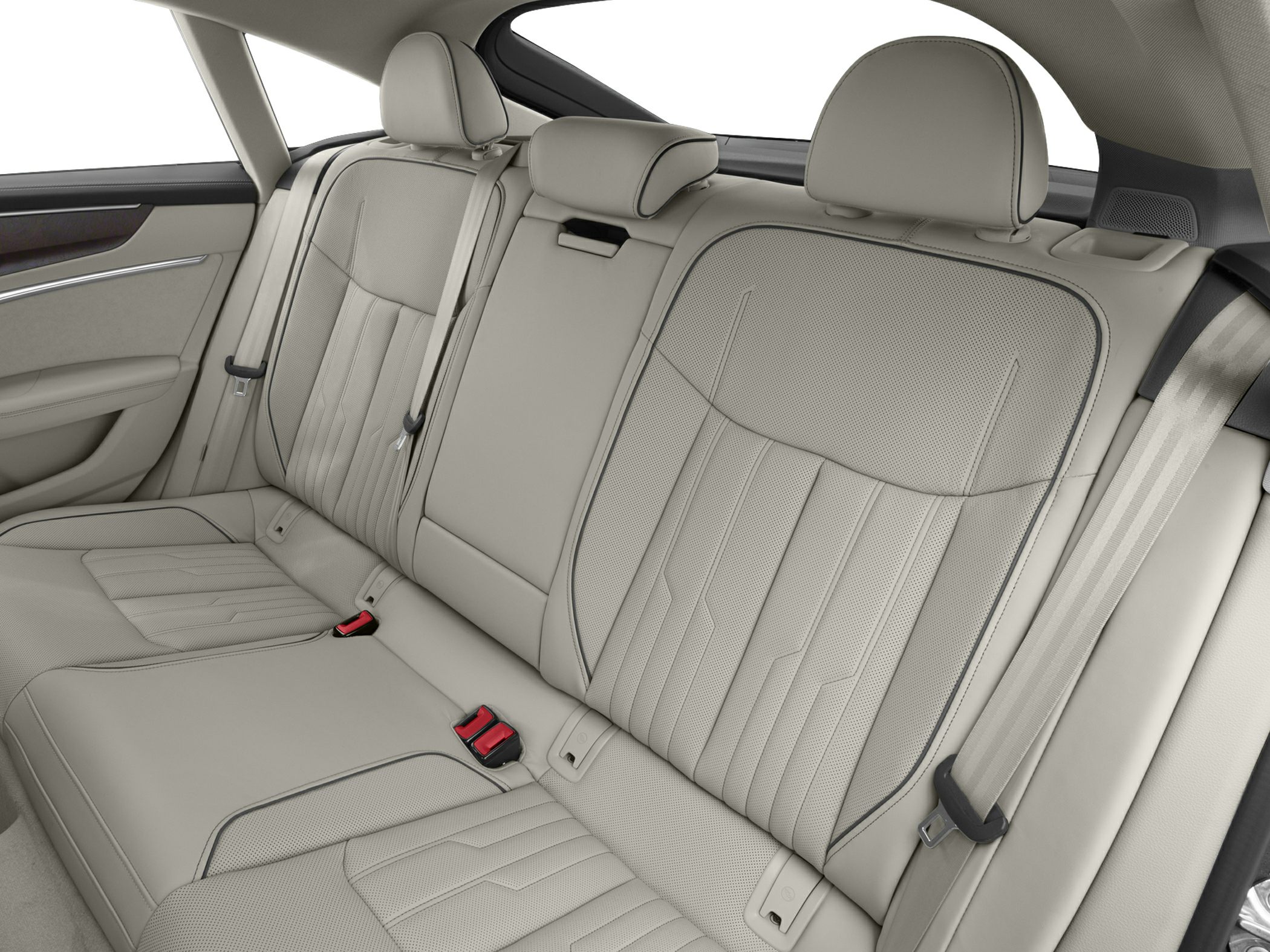 Beige leather rear seats with detailed stitching and headrests.