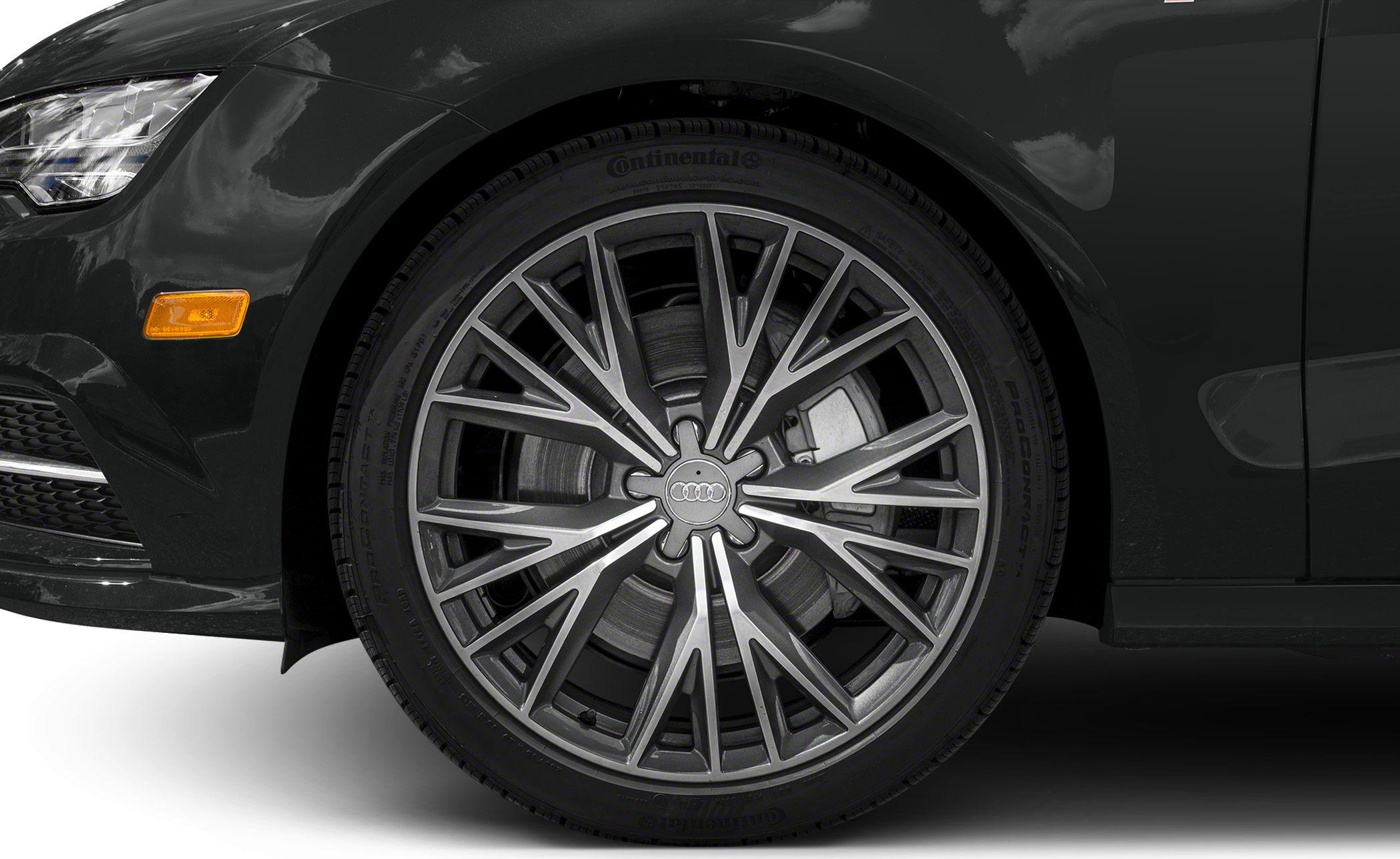 Multi-spoke alloy wheel and front headlight section