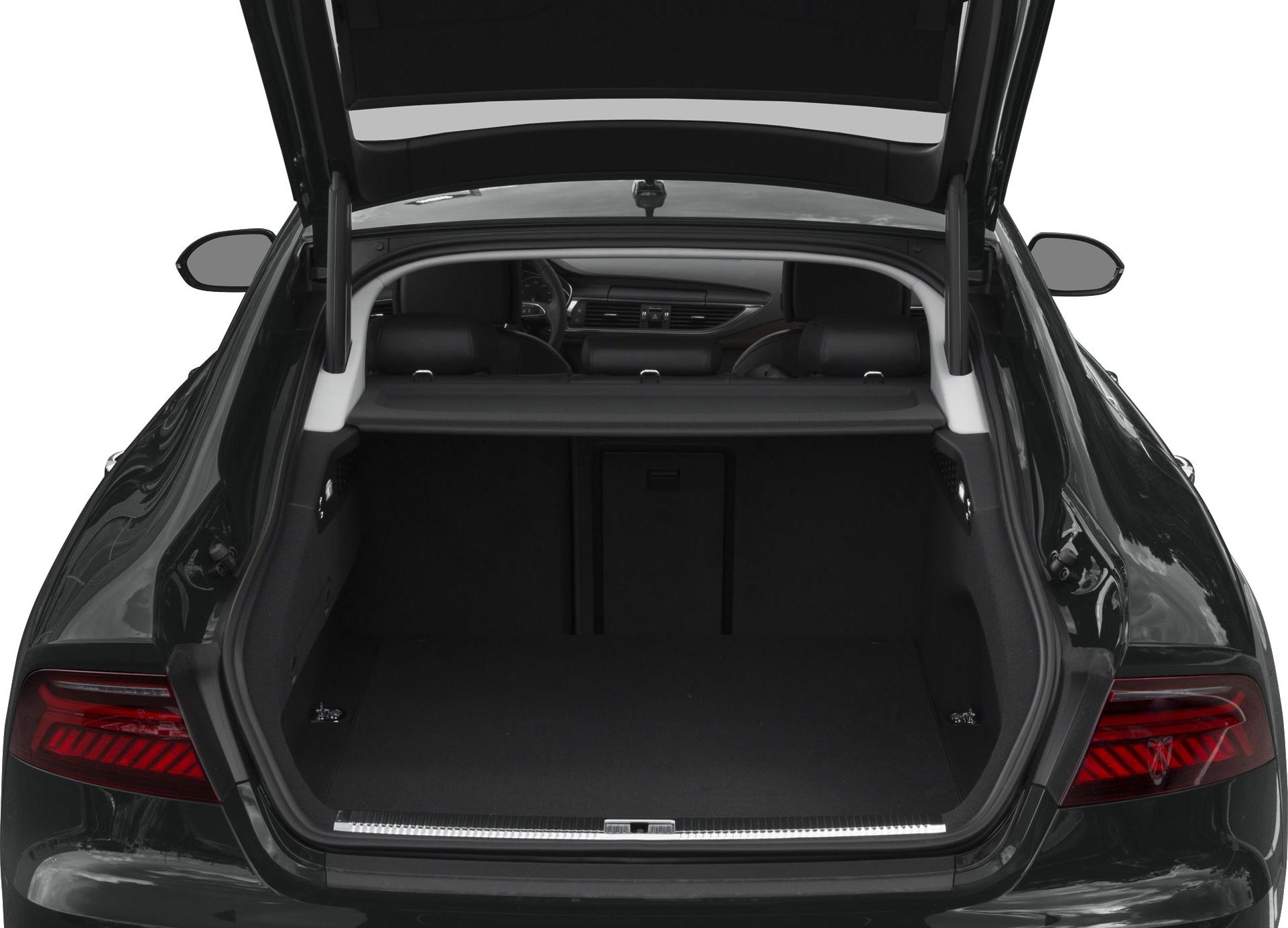 Open trunk interior with spacious cargo area and rear seats visible.