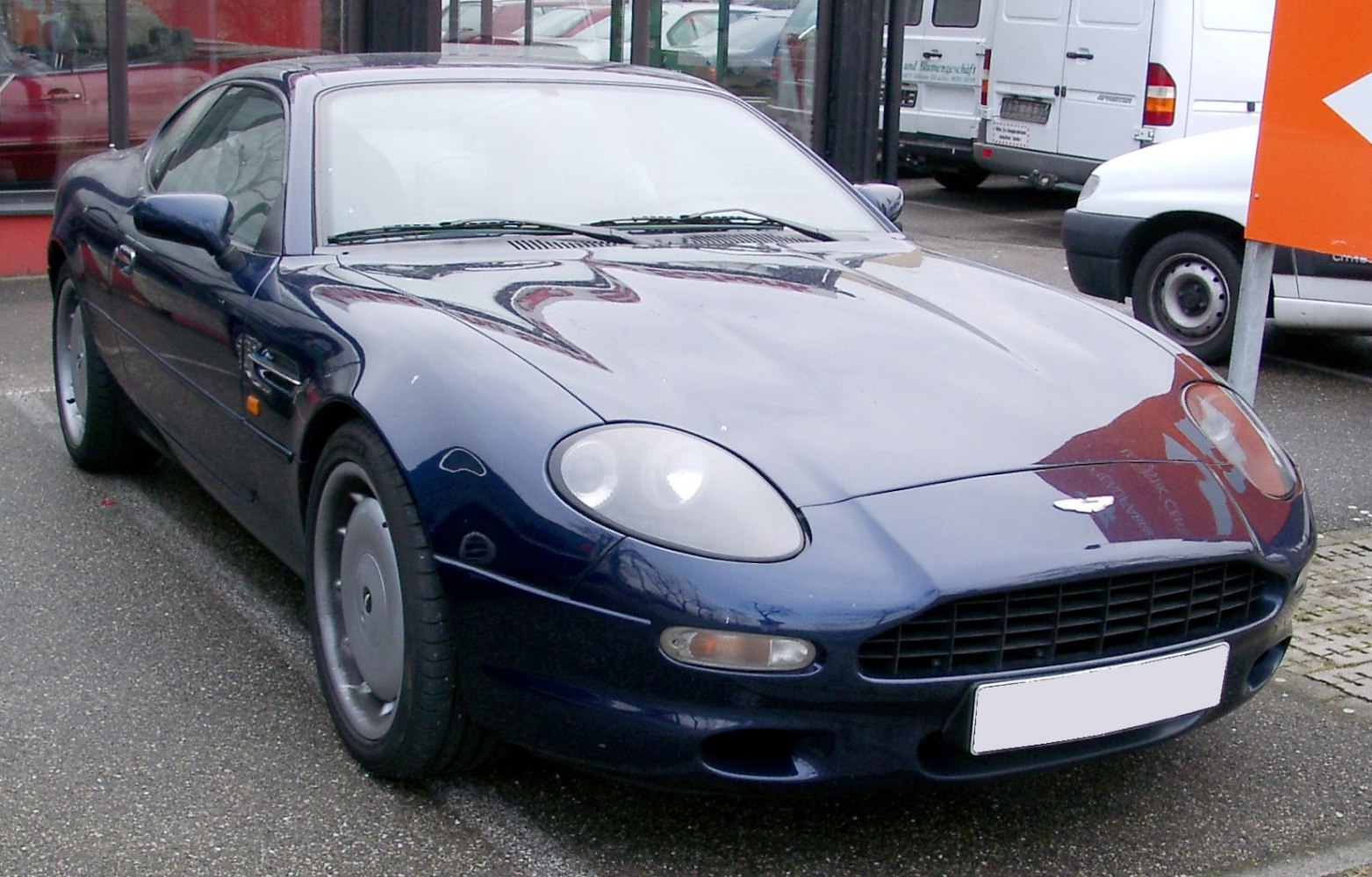 Sleek front end with classic grille and rounded headlights