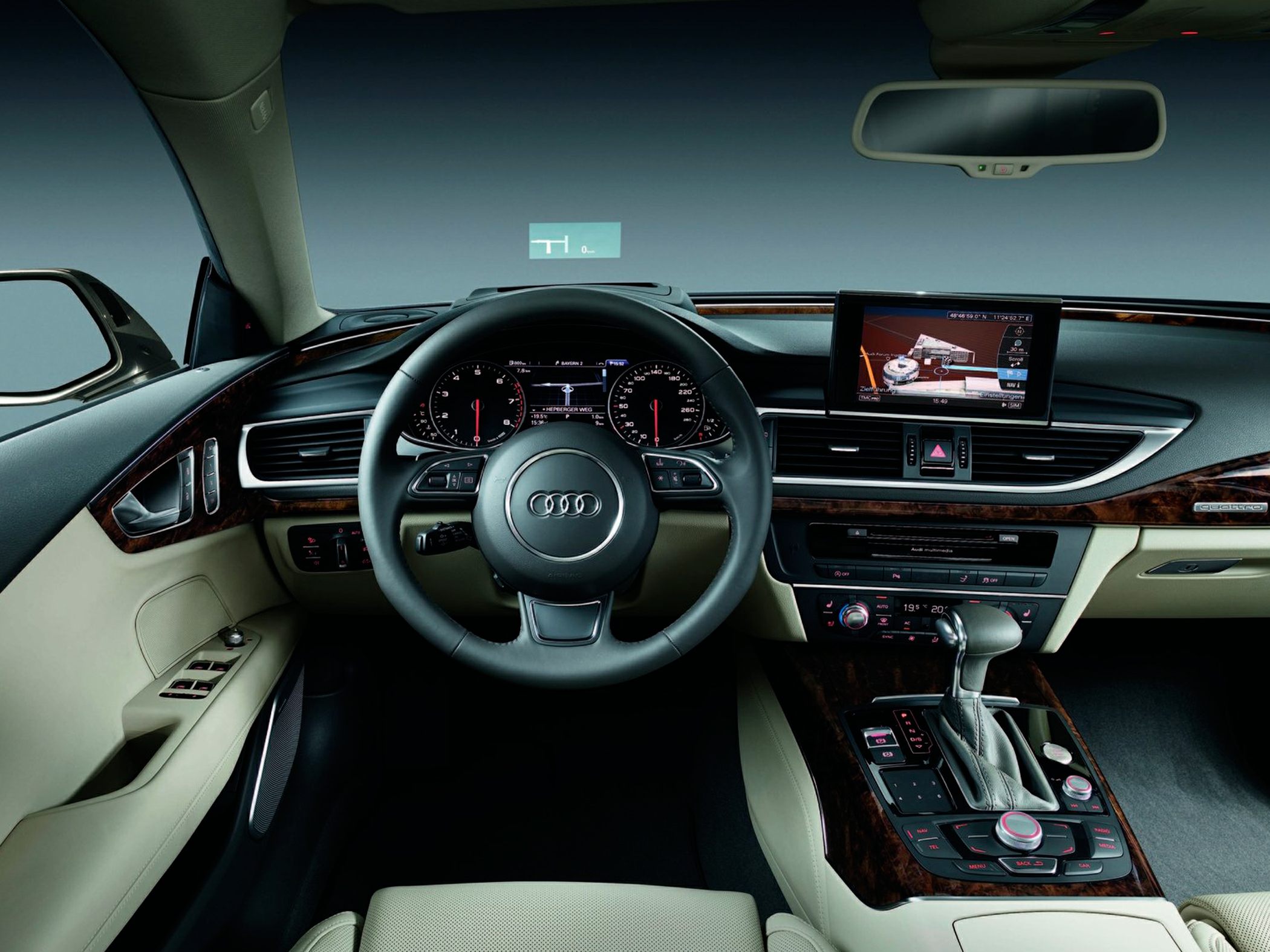 Audi-style steering wheel and dashboard with navigation screen and wood trim