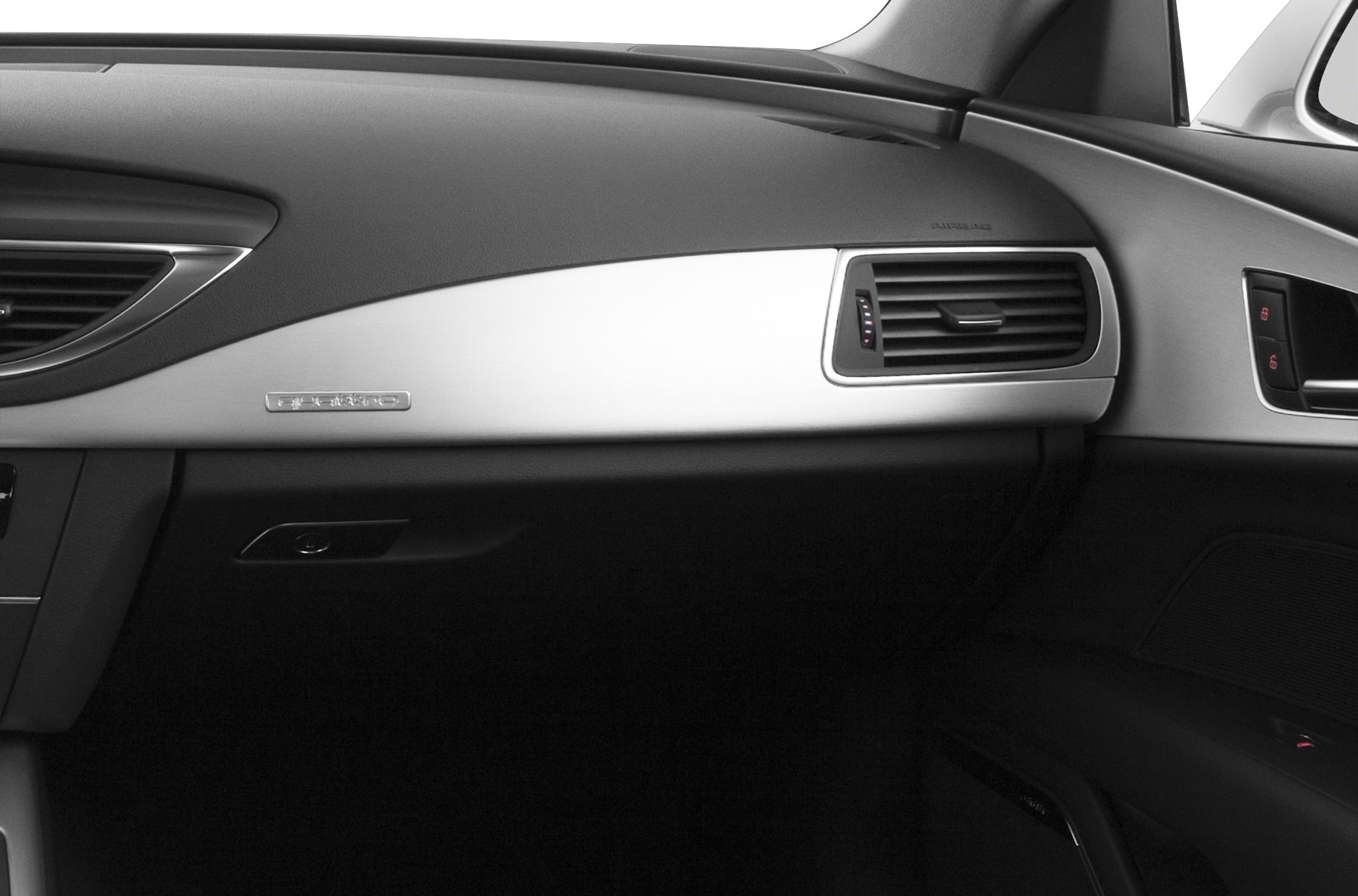 Aluminum trim dashboard with air vent in luxury car interior