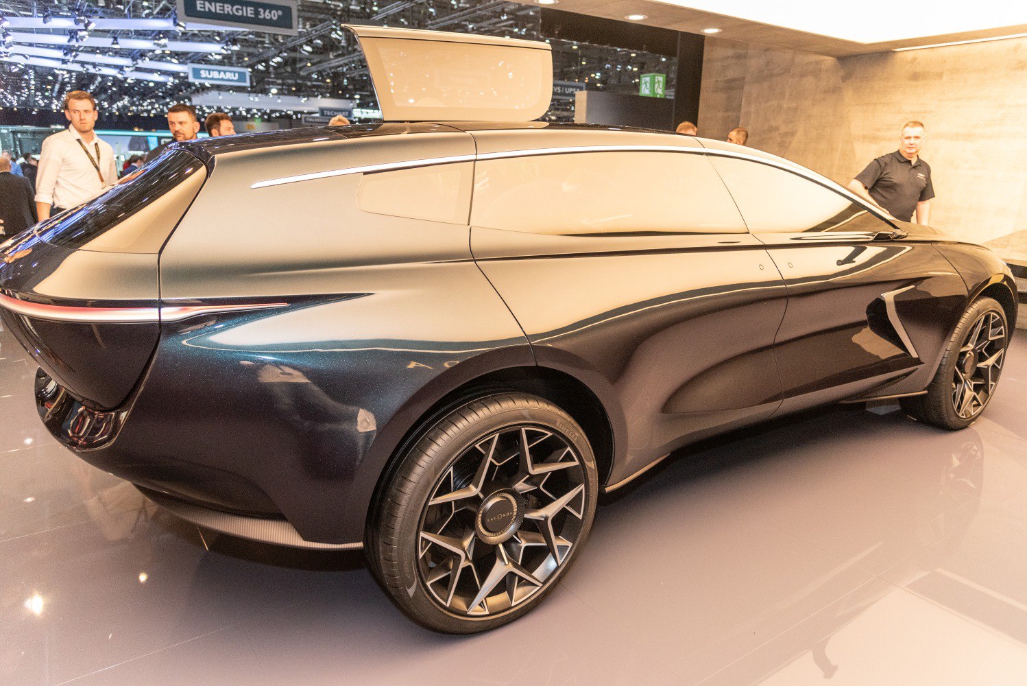 Sleek futuristic SUV with seamless body and unique alloy wheels
