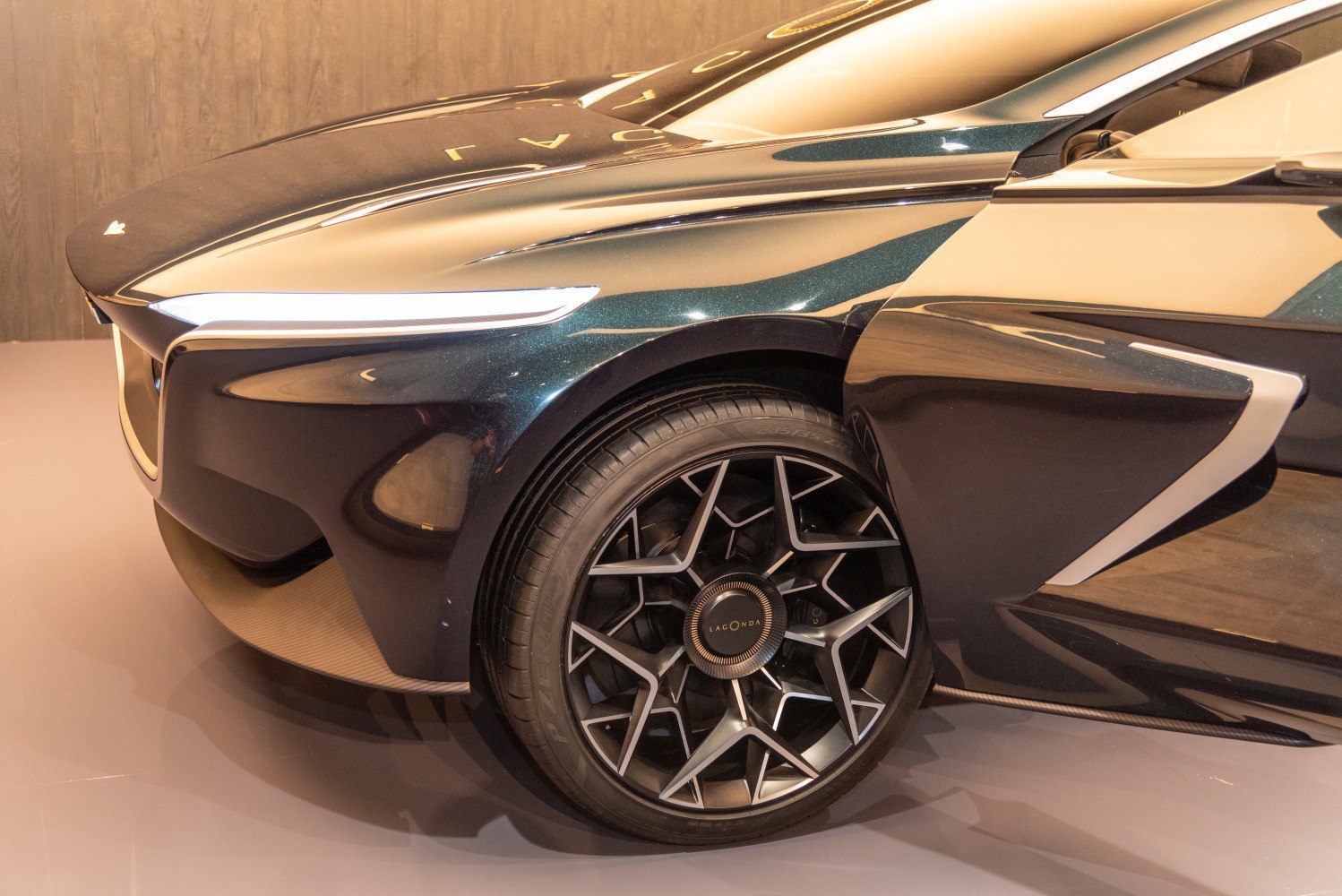 Front wheel with futuristic alloy rim and unique door design