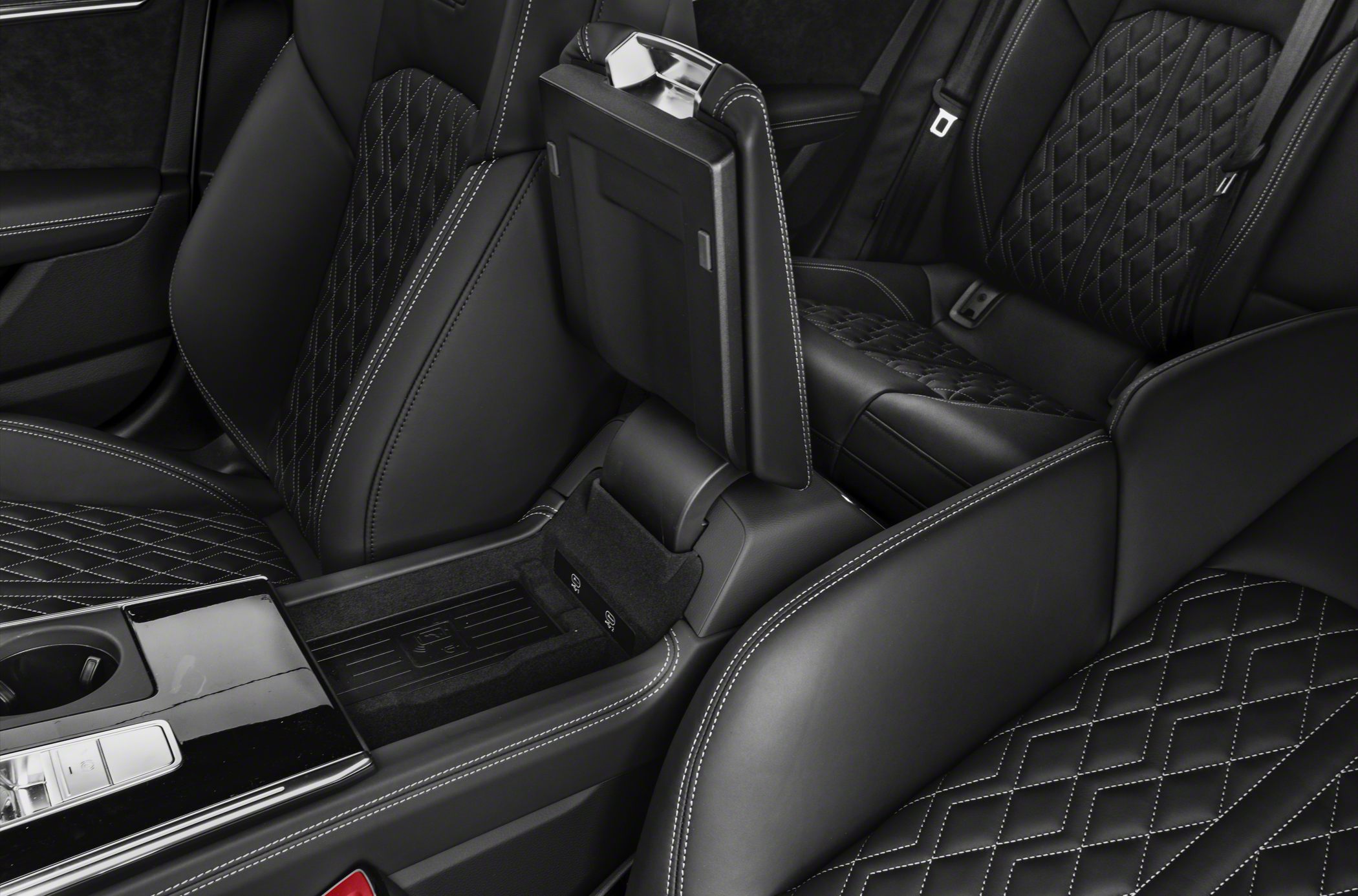 Luxury quilted black leather seats with white stitching