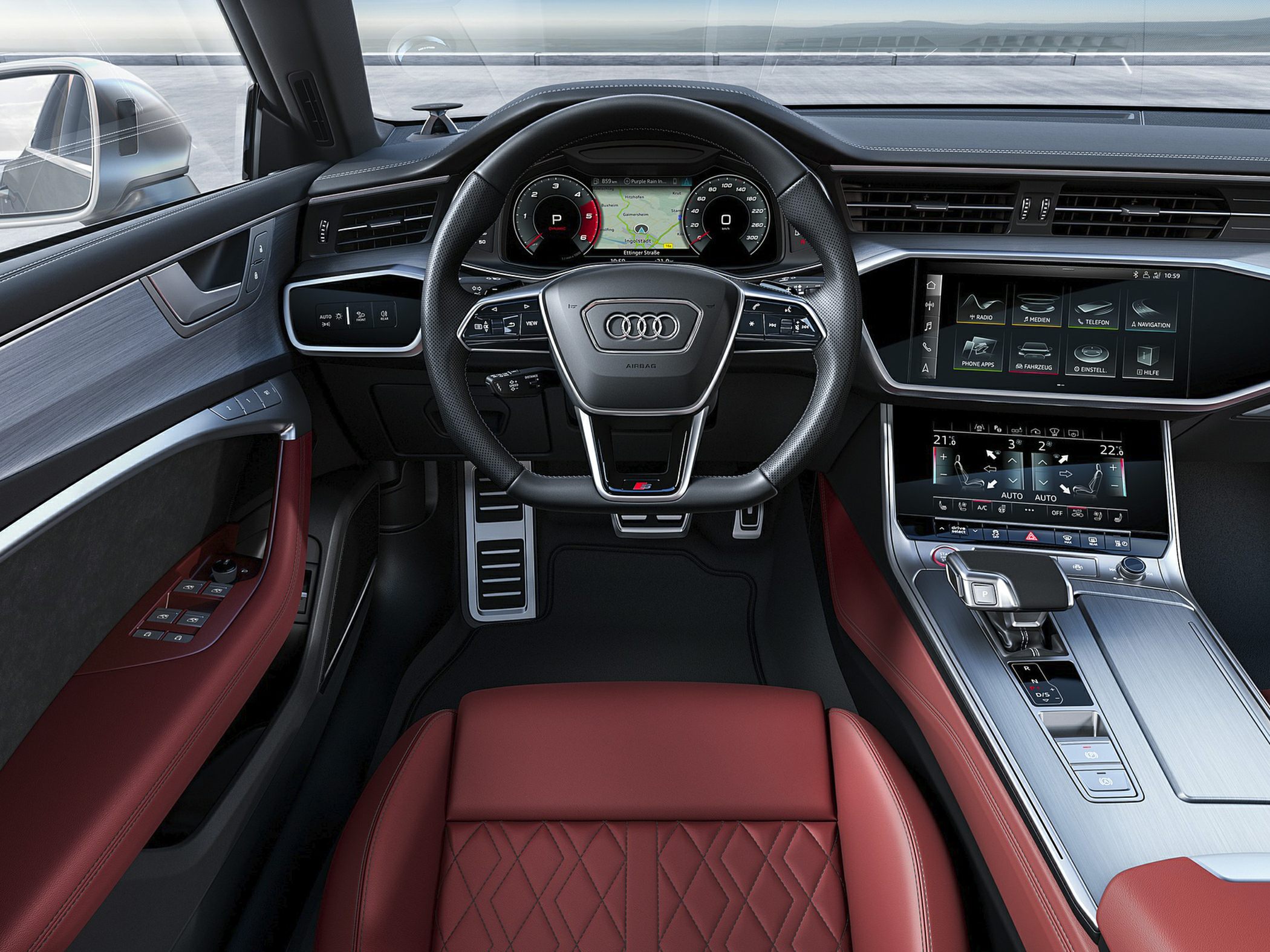 Dual digital displays and diamond-stitched leather interior with modern controls