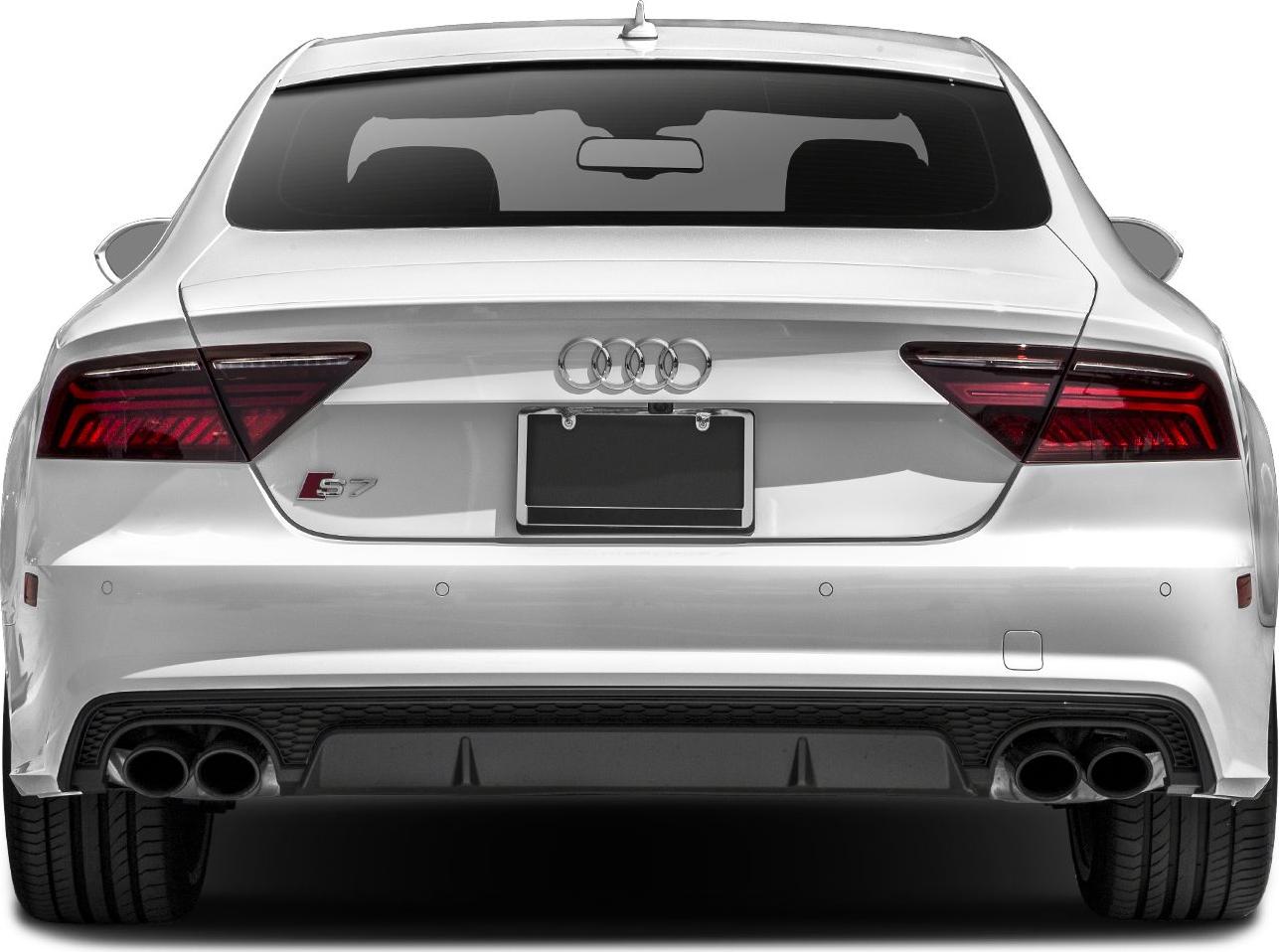 Rear view with sharp LED taillights and quad exhaust pipes