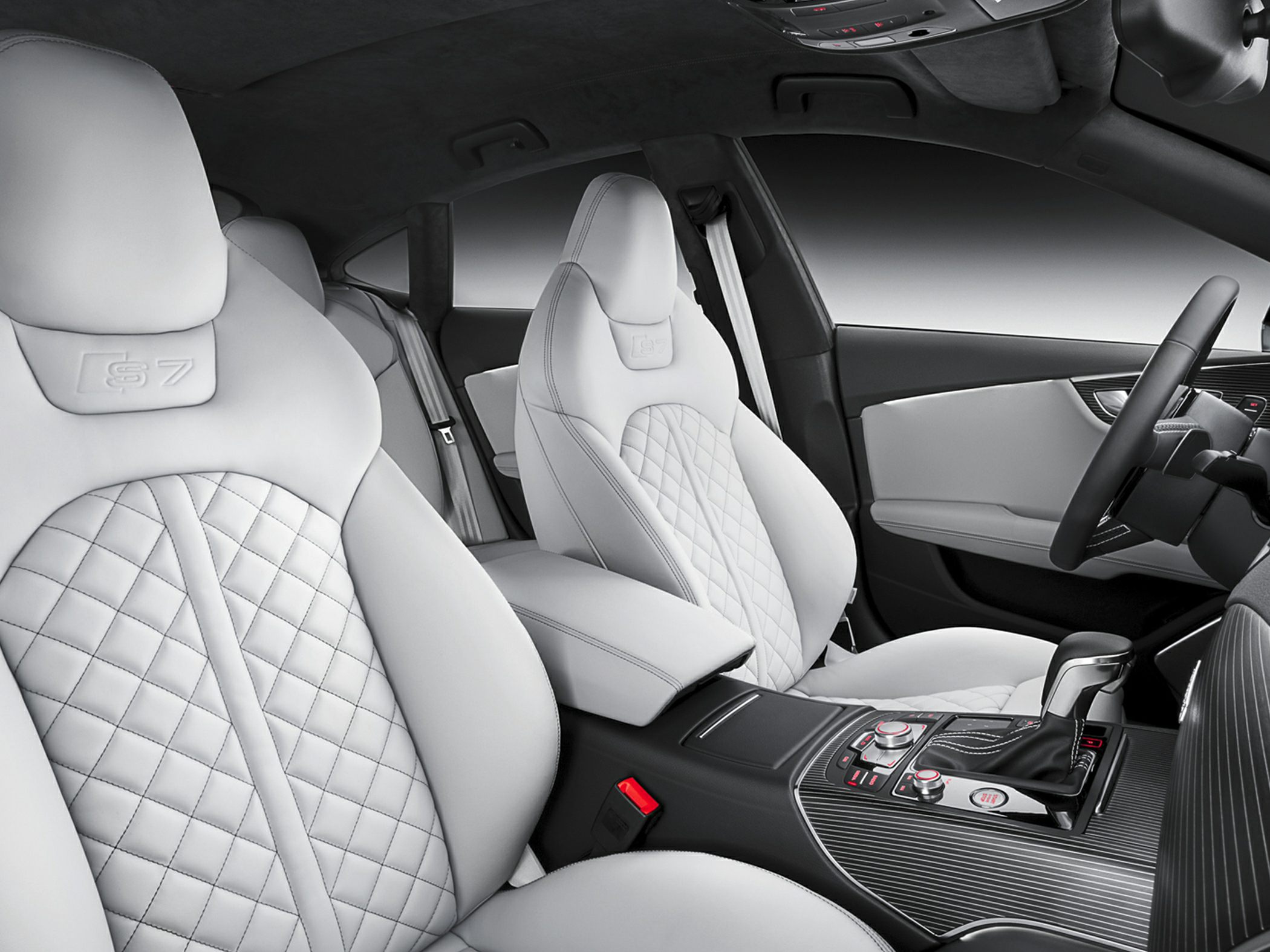 Luxury leather seats with diamond stitching and advanced center console.
