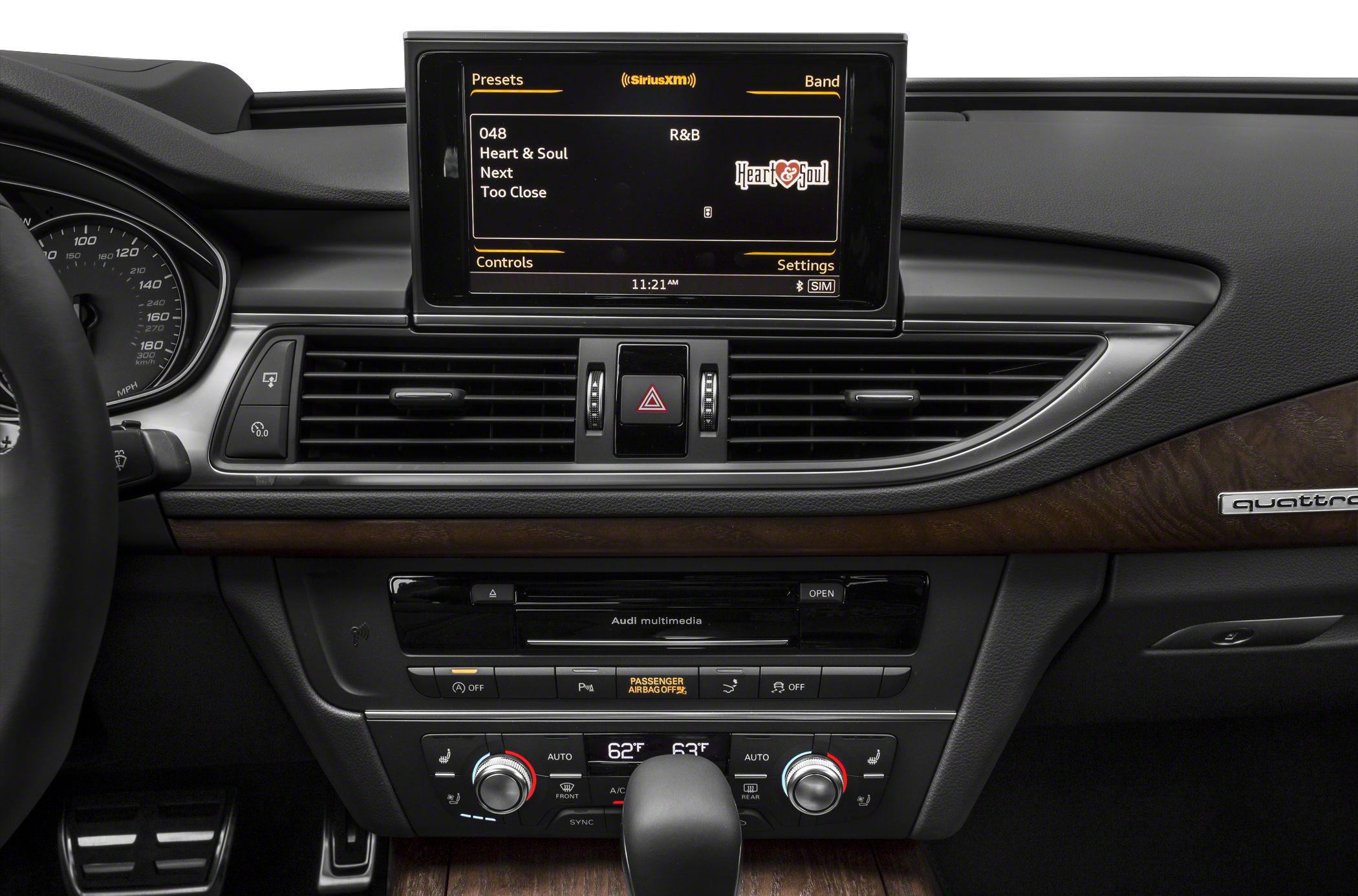 Digital multimedia display and dual-zone climate control with wood trim dashboard