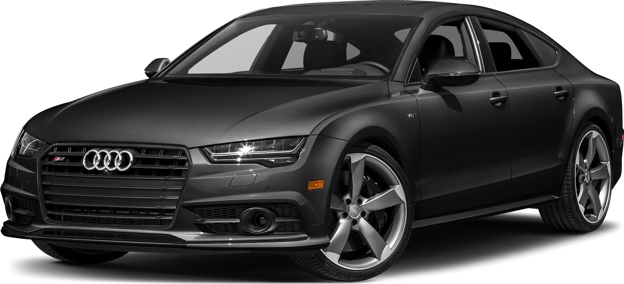Front grille and five-spoke alloy wheels of a sporty sedan.