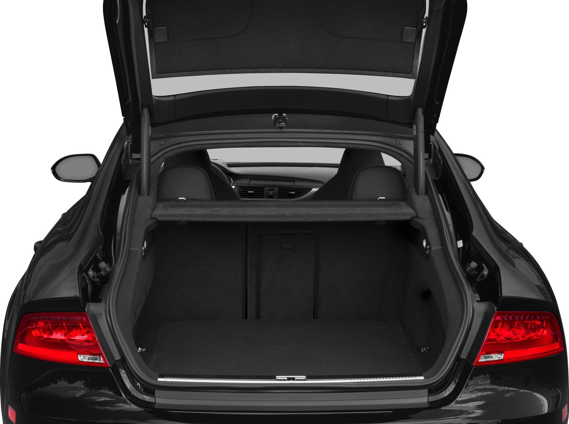 Open trunk of a luxury hatchback showing cargo space and rear interior.