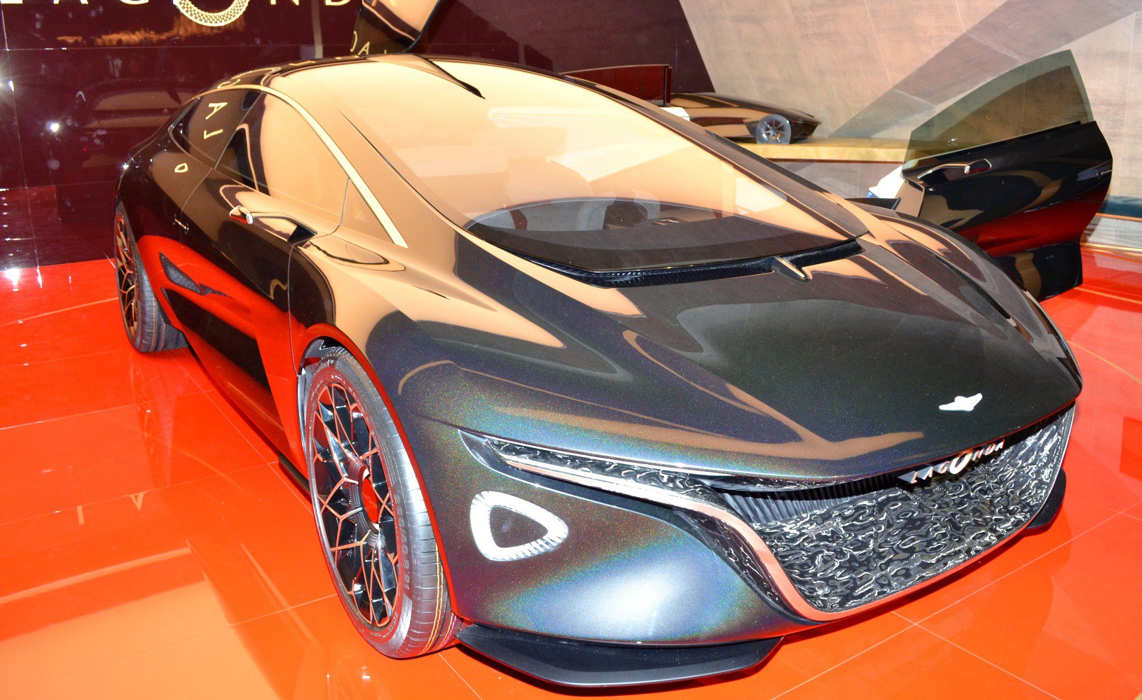 Sleek aerodynamic front with intricate grille and unique daytime running lights.