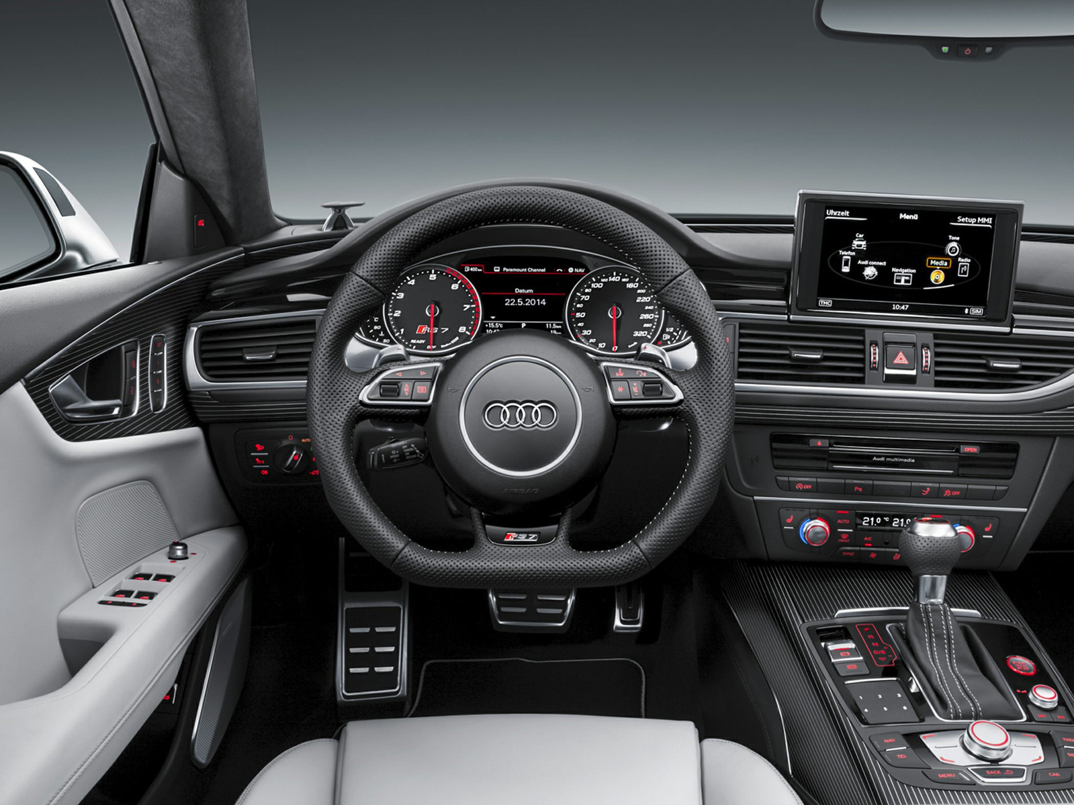Audi steering wheel, instrument cluster, carbon fiber dash, infotainment center