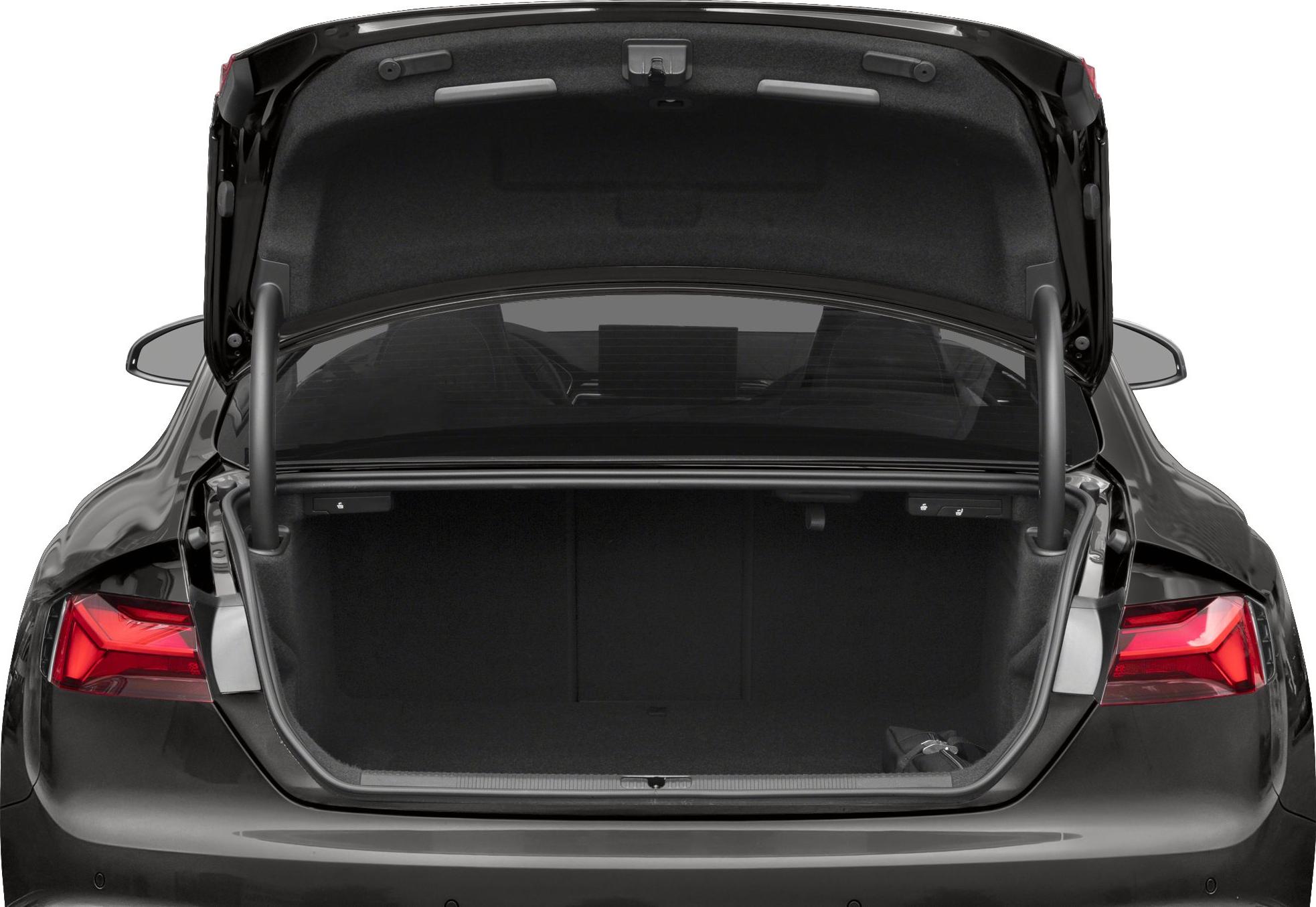 Spacious open trunk and LED tail lights on a modern luxury coupe rear