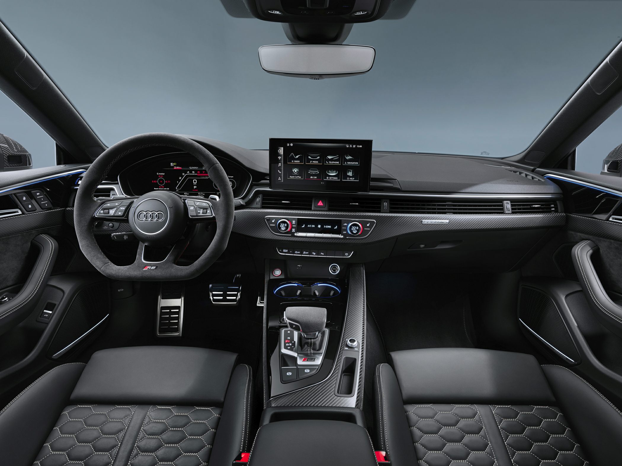 Digital cockpit and carbon fiber trim with central infotainment screen