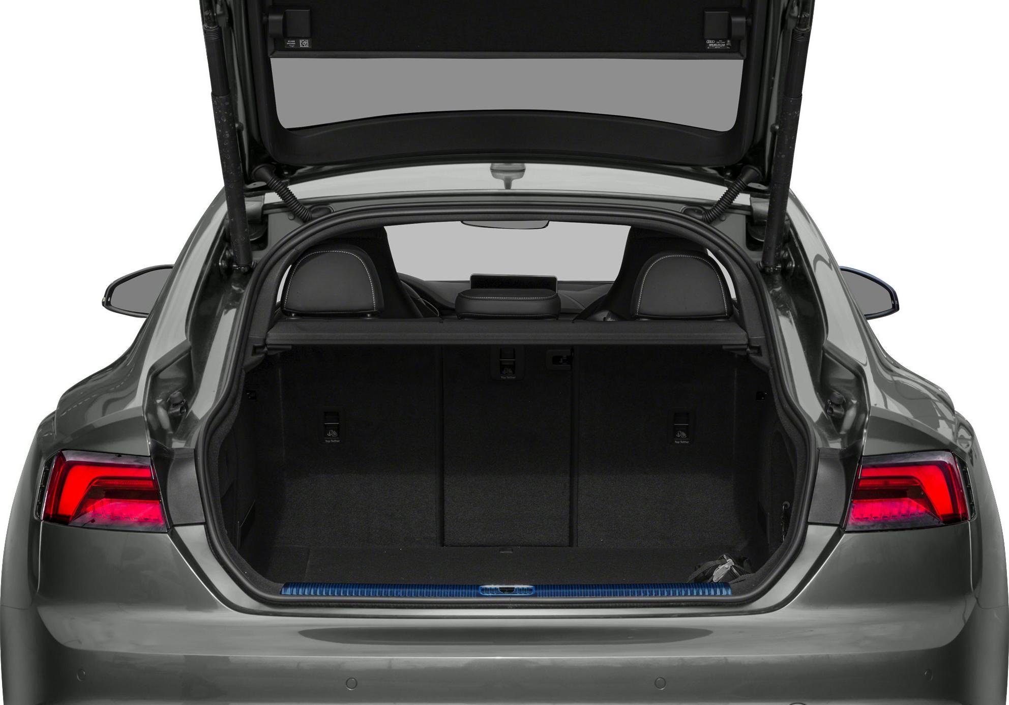 Spacious open rear cargo trunk with visible rear seats and taillights