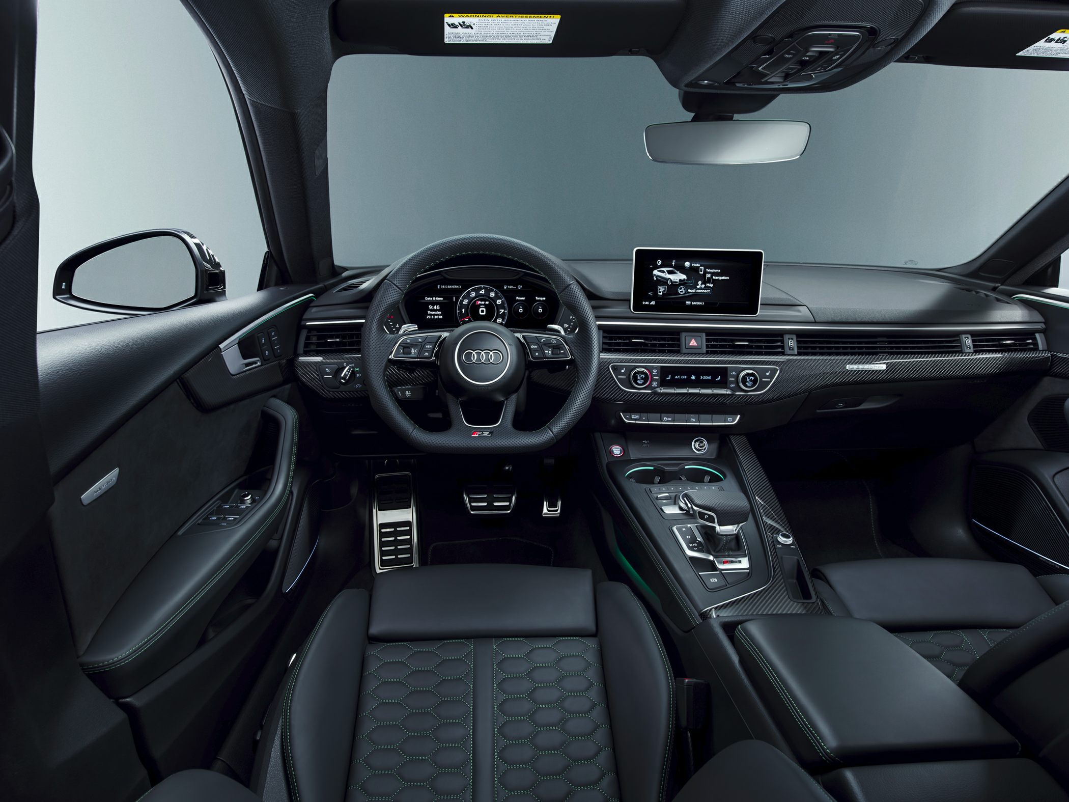Sporty interior with digital dashboard and carbon fiber trim