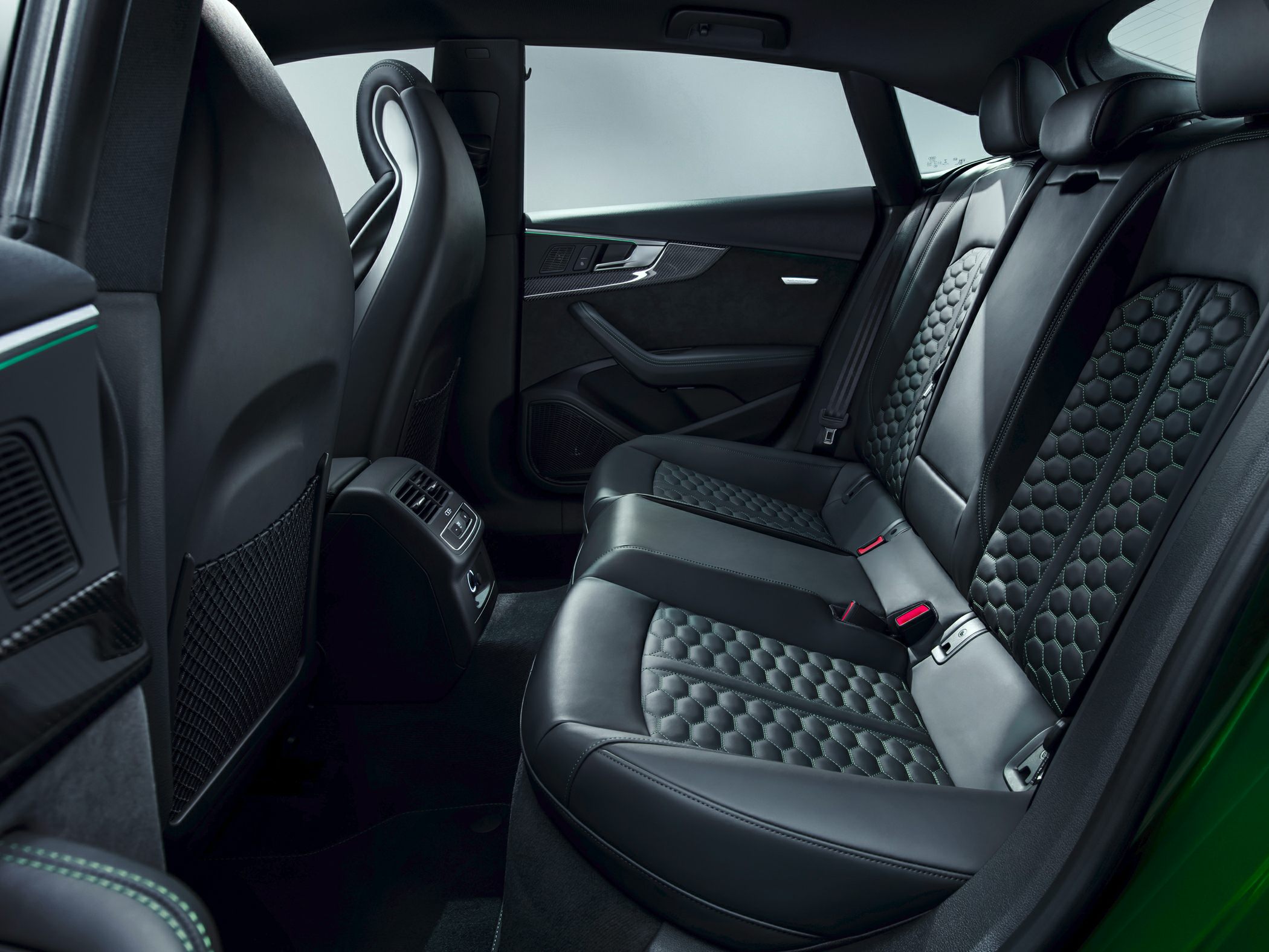 Rear interior with quilted leather seats and modern design elements