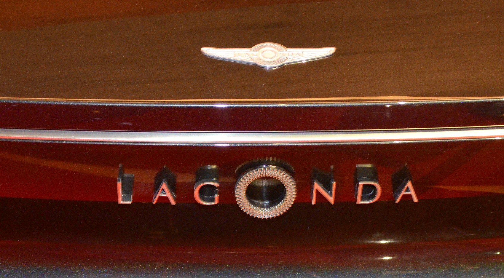 Close-up of luxury car emblem and Lagonda nameplate