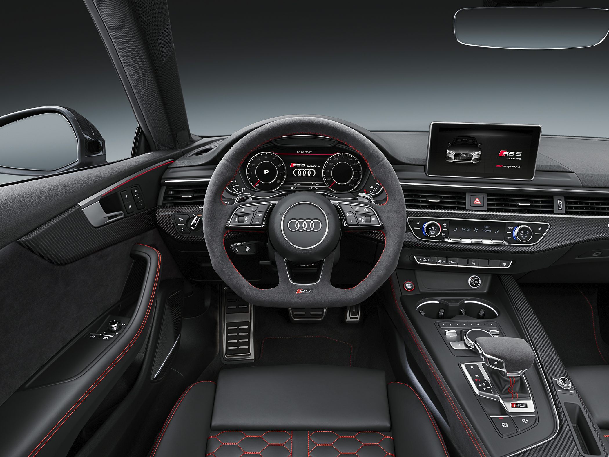 Digital dashboard and sporty steering wheel with carbon fiber accents