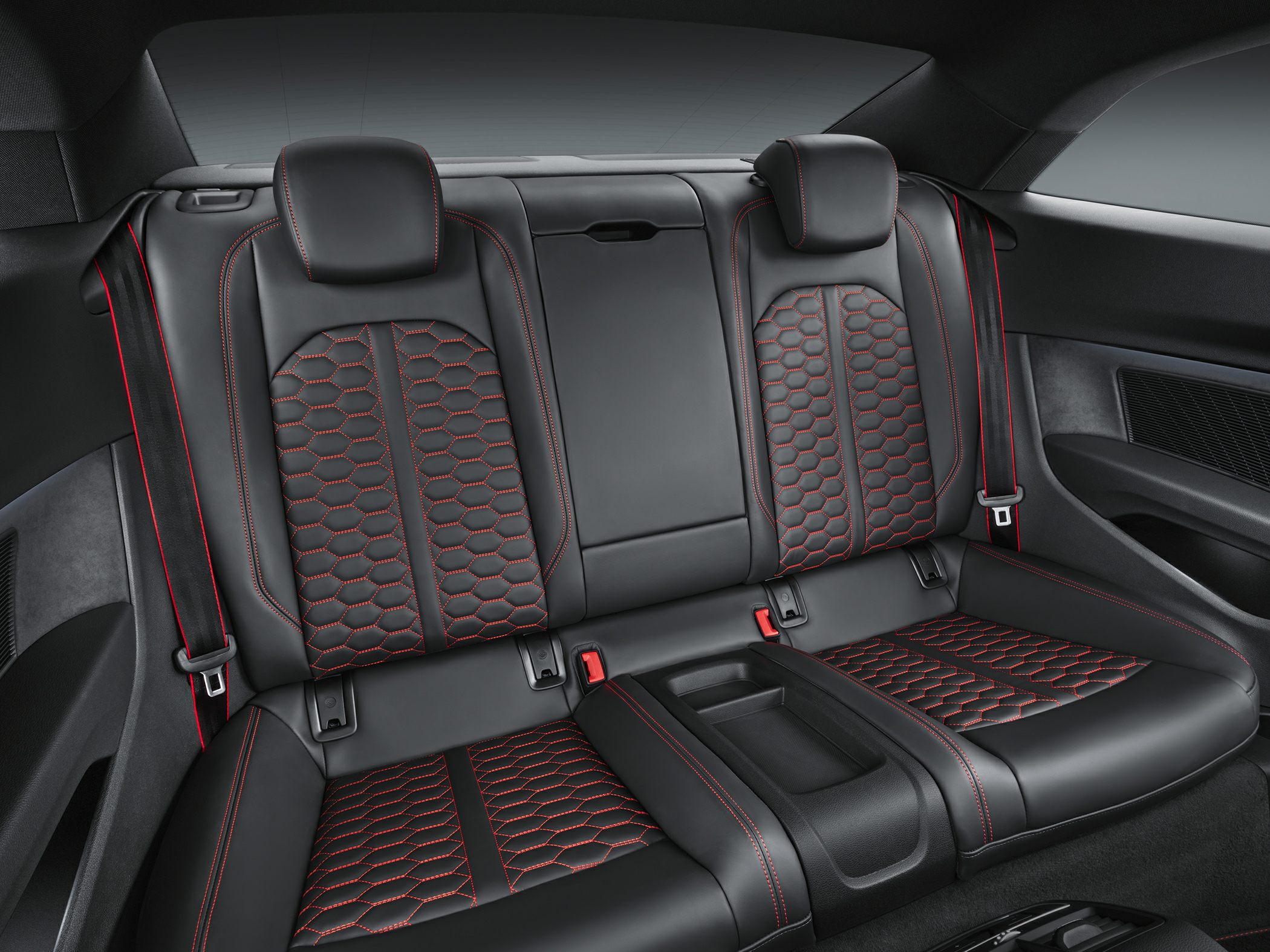 Rear seats with black leather and red hexagonal stitching