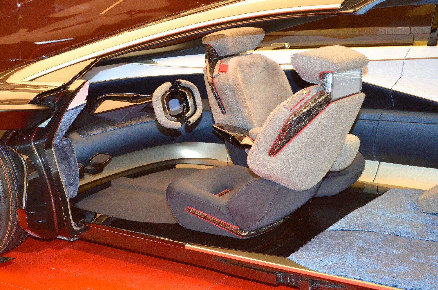 Futuristic car interior with unique seats and steering wheel