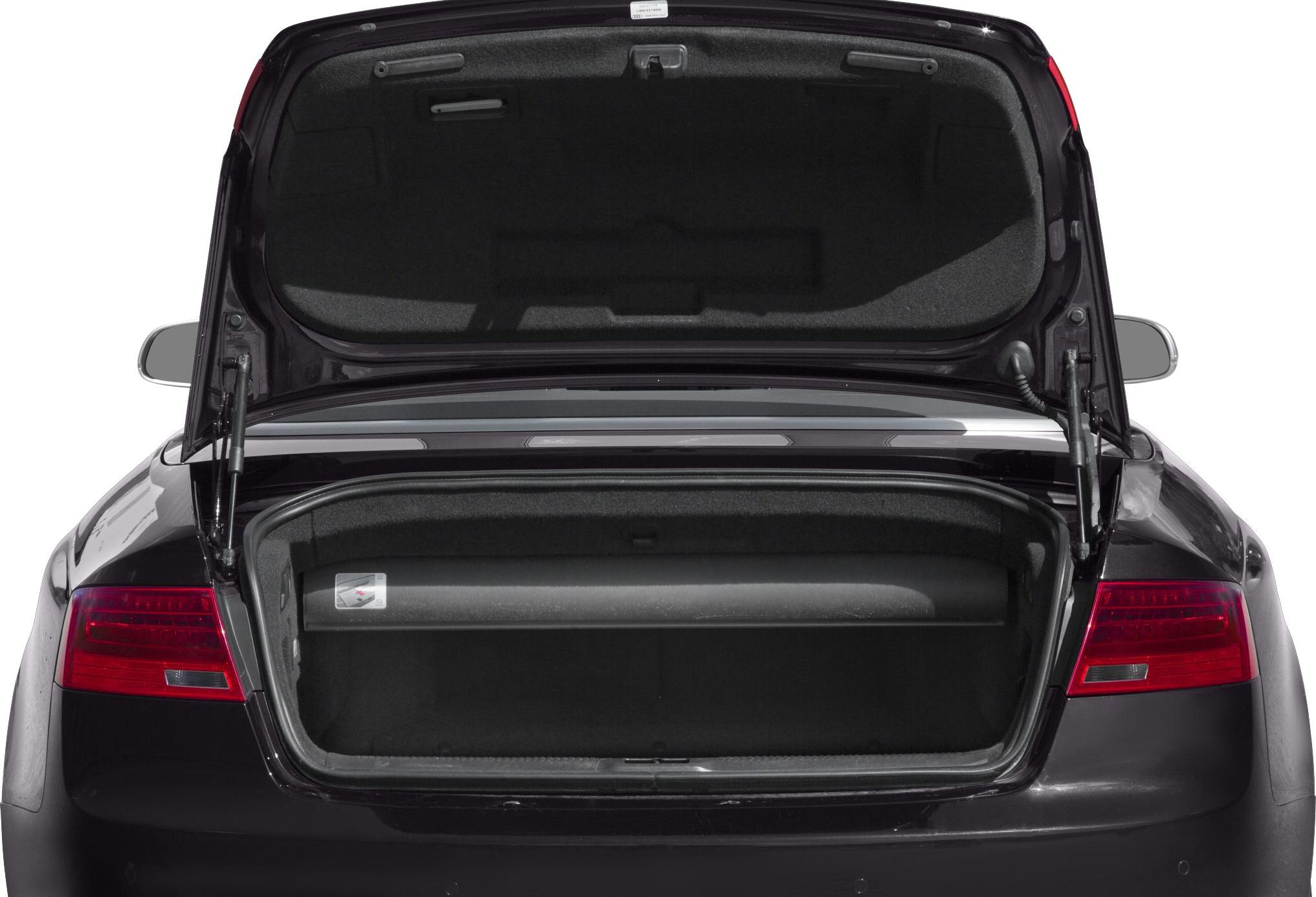 Open trunk with visible hinges and rear taillights