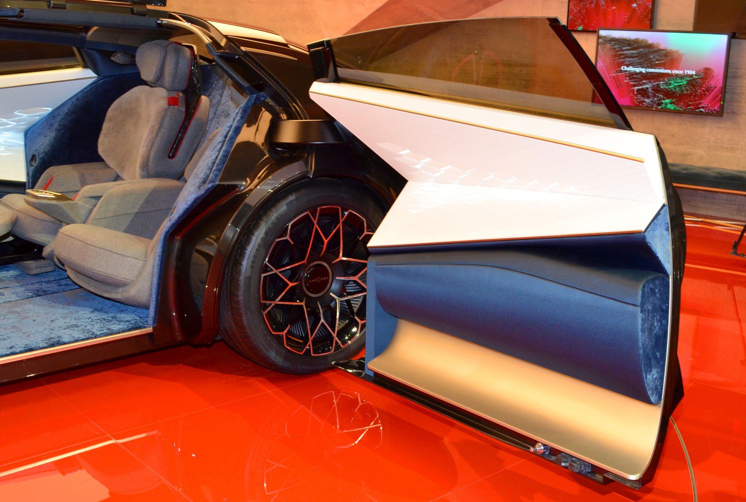 Futuristic butterfly door with plush interior seating