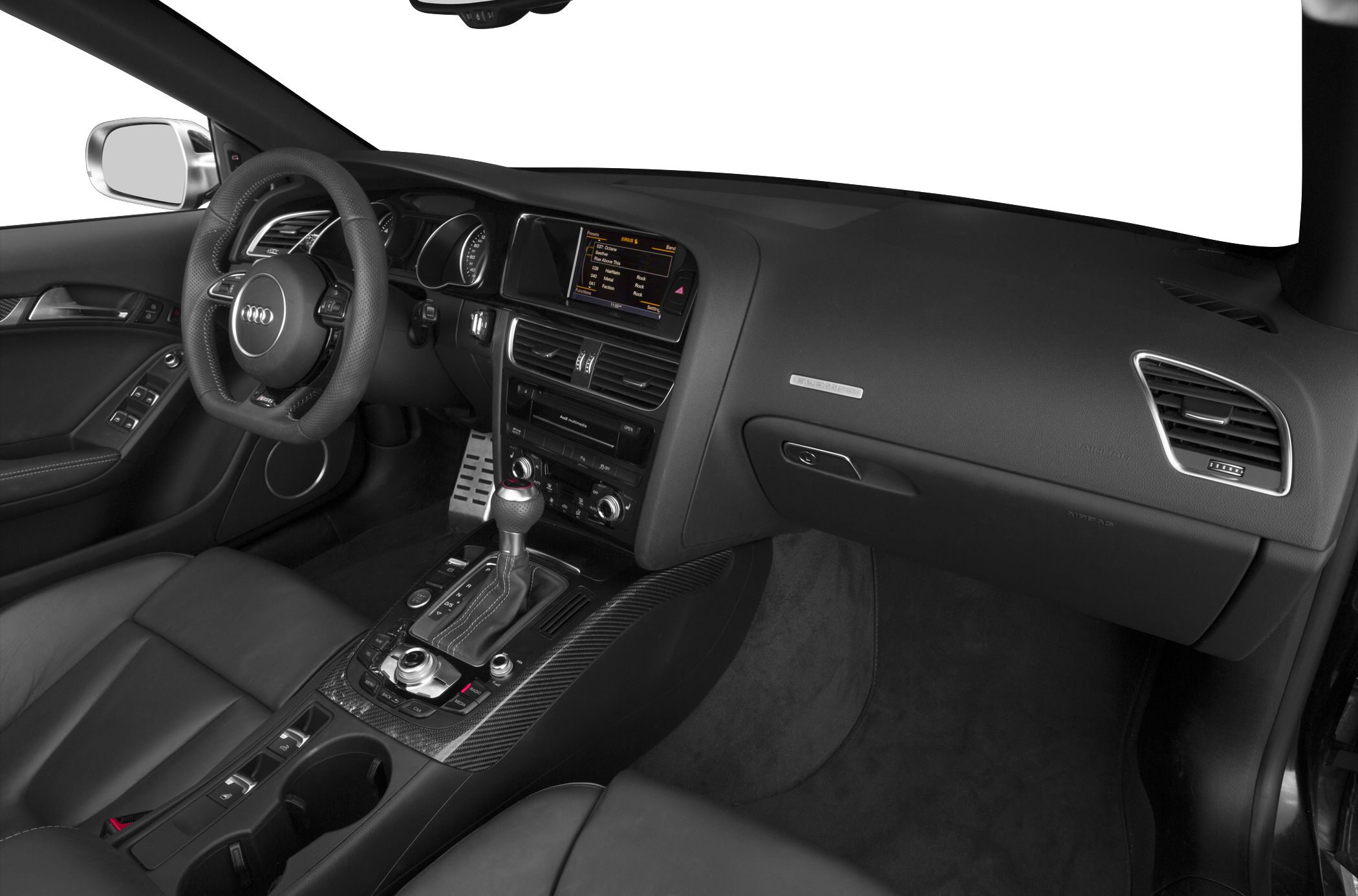 Cockpit with dashboard, steering wheel, infotainment screen, and center console