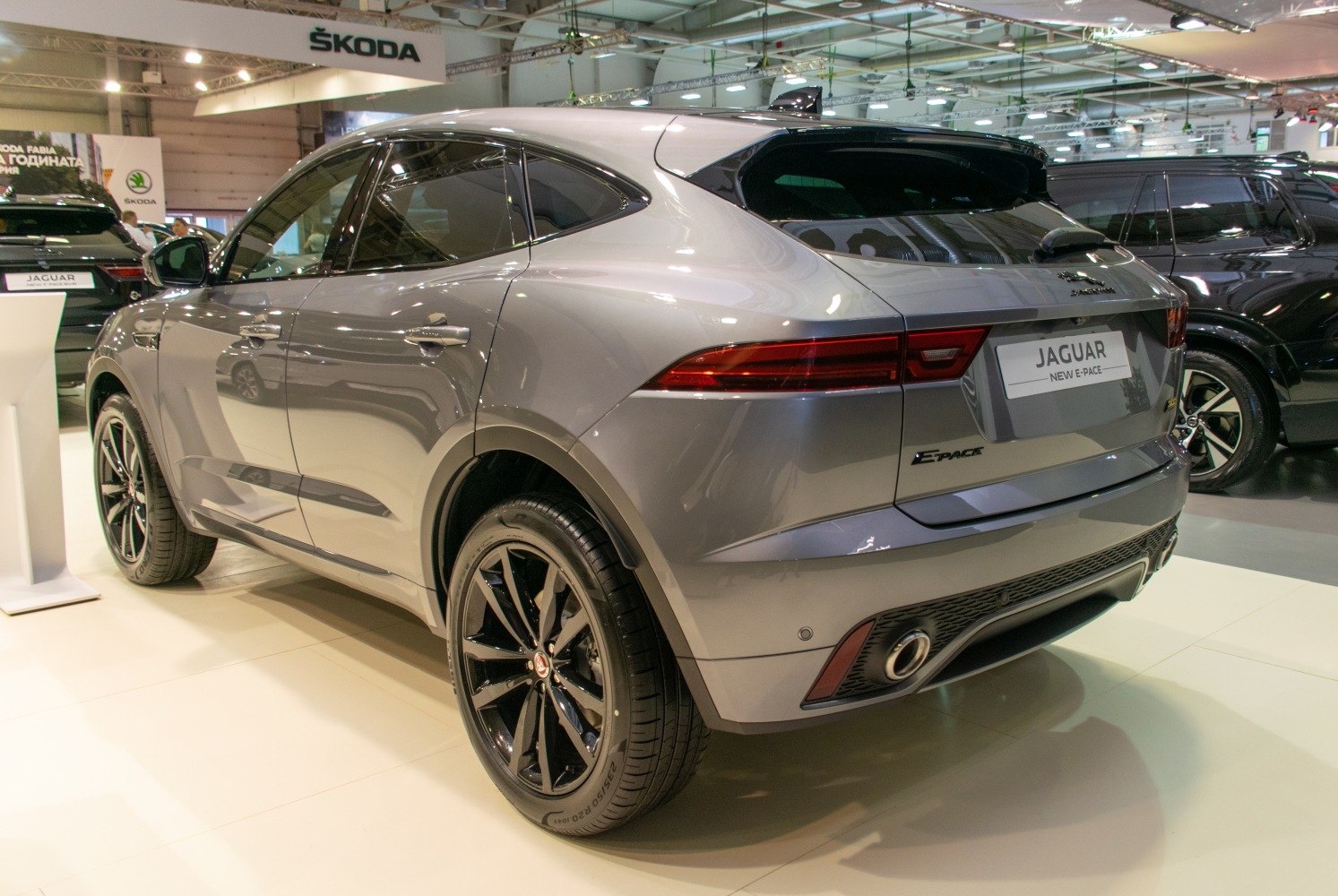 Rear view with sleek taillights and black alloy wheels