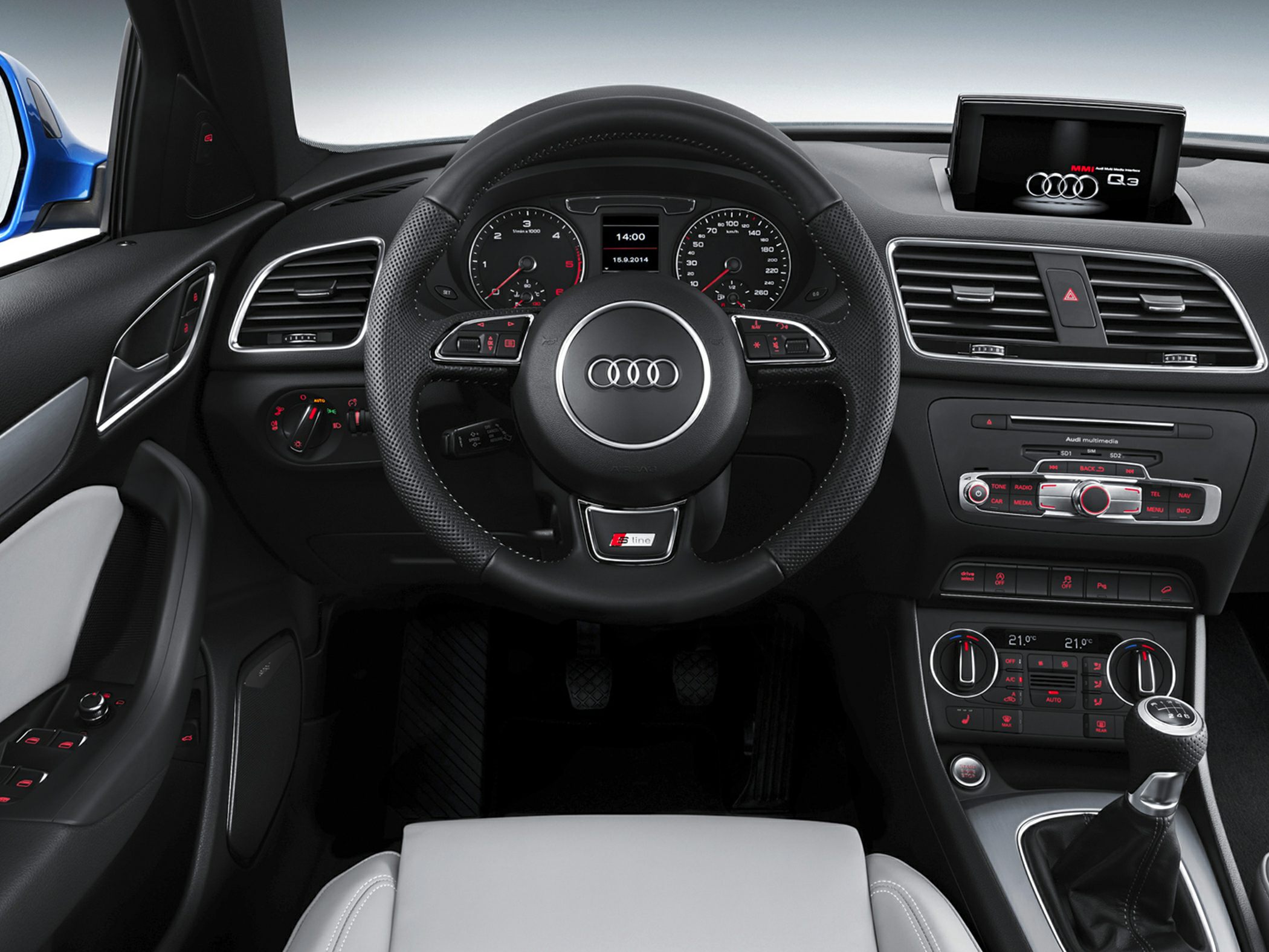 Audi car interior dashboard with steering wheel and multimedia screen