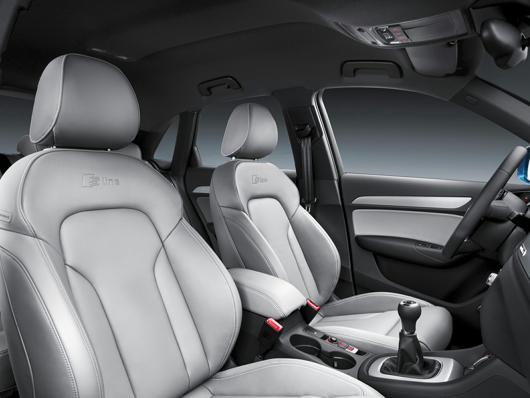 Gray S Line sport seats and manual gearshift in modern car interior